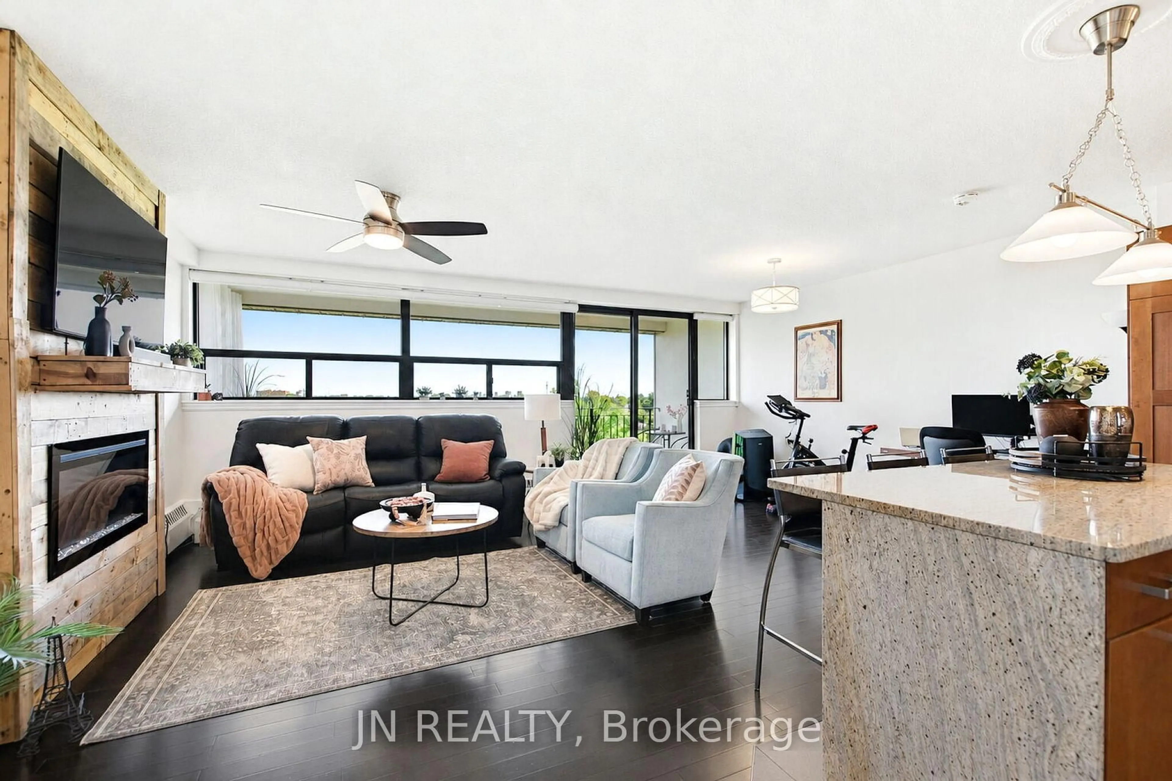 Living room with furniture, unknown for 188 Mill St #409, Brampton Ontario L6Y 1T8