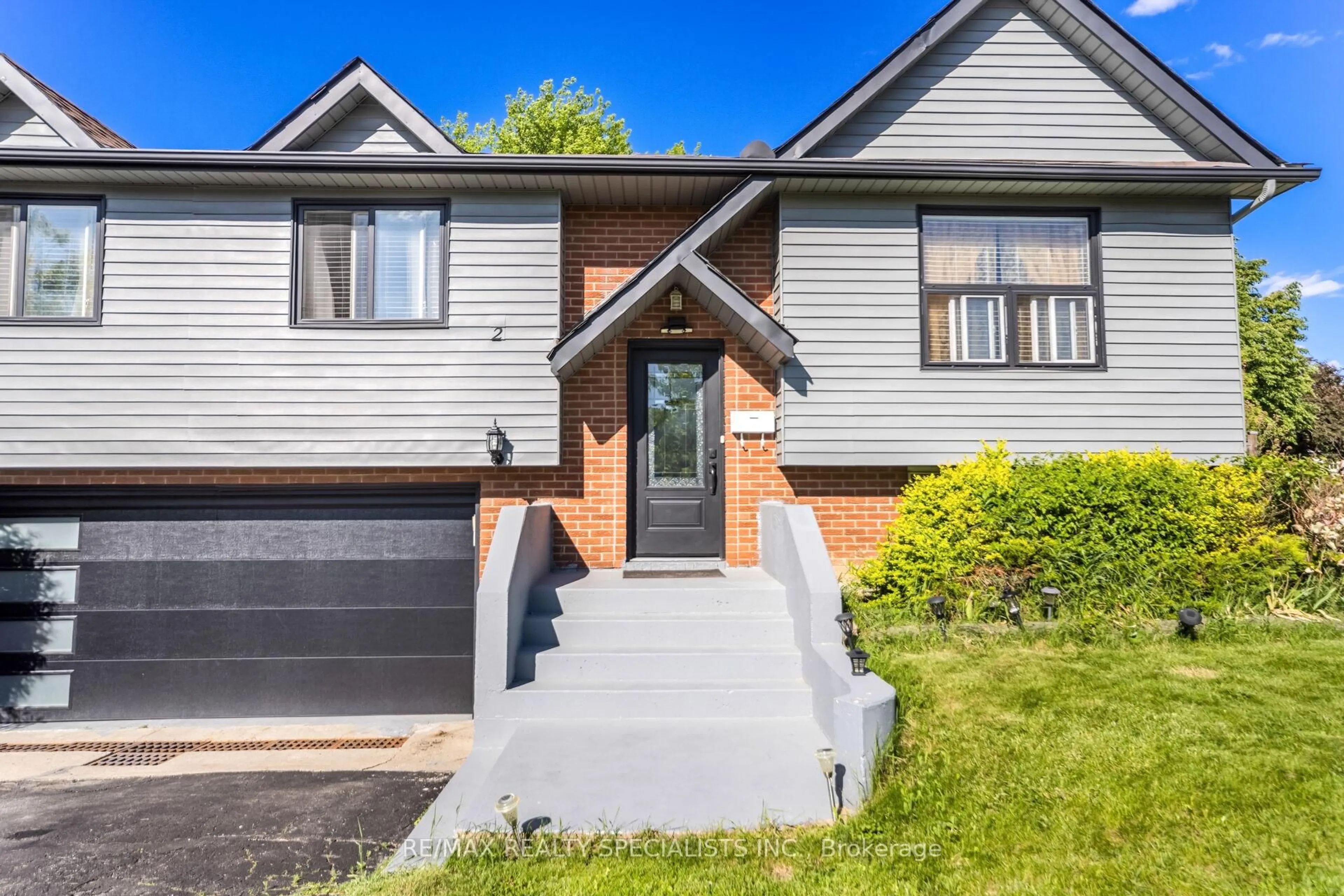 Home with brick exterior material, street for 2 Ivybridge Dr, Brampton Ontario L6V 2X2
