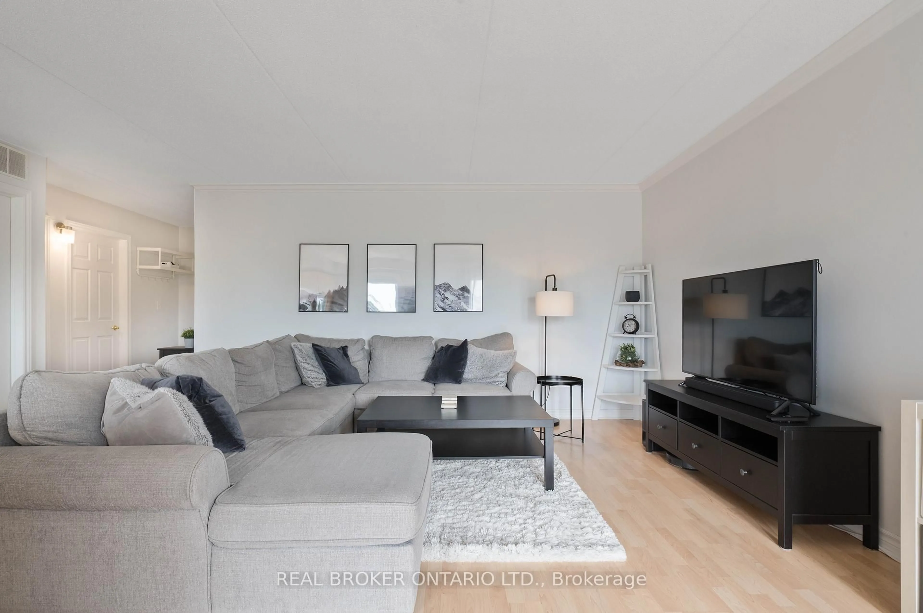 Living room with furniture, unknown for 4450 Fairview St #304, Burlington Ontario L7L 7K7