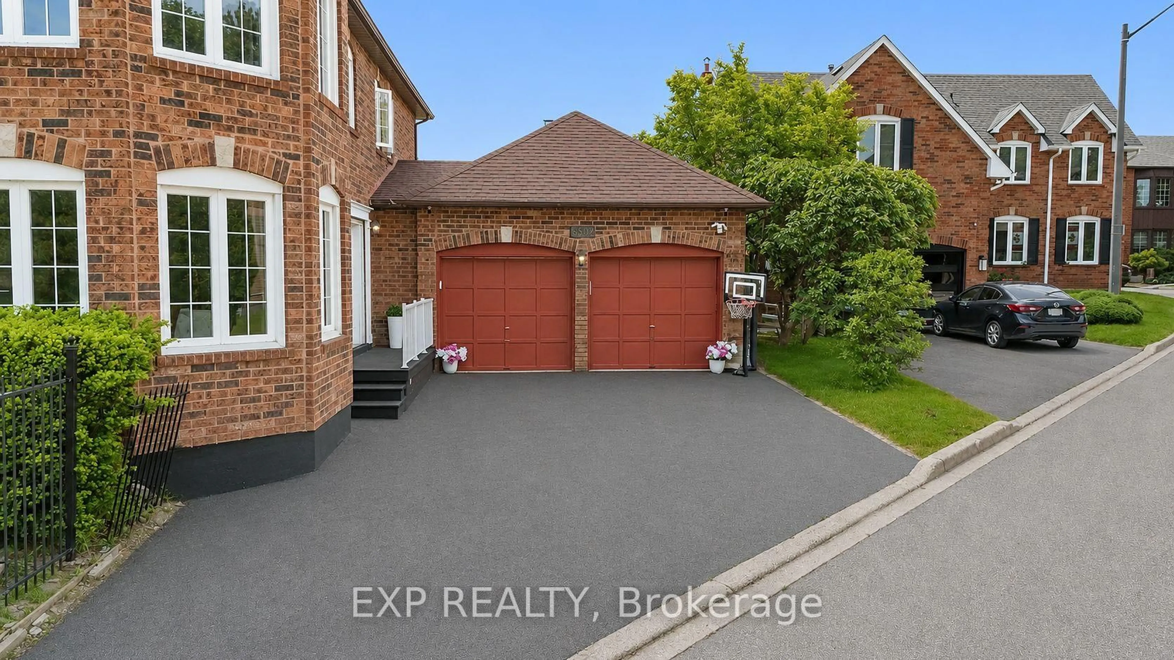 Home with brick exterior material, street for 6502 Tenth Line, Mississauga Ontario L5N 5T7
