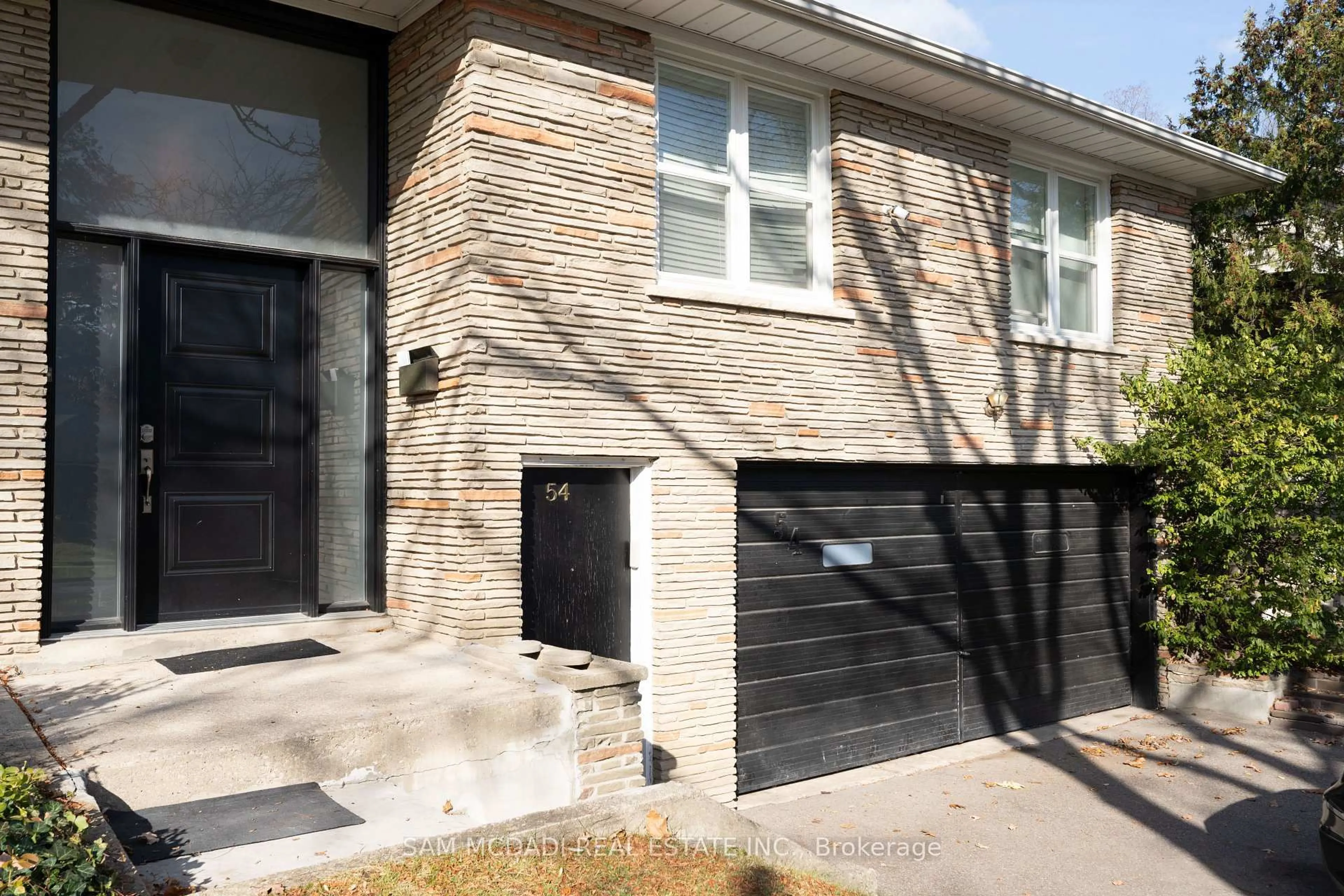 Home with brick exterior material, street for 54 Bearbury Dr, Toronto Ontario M9C 2G9