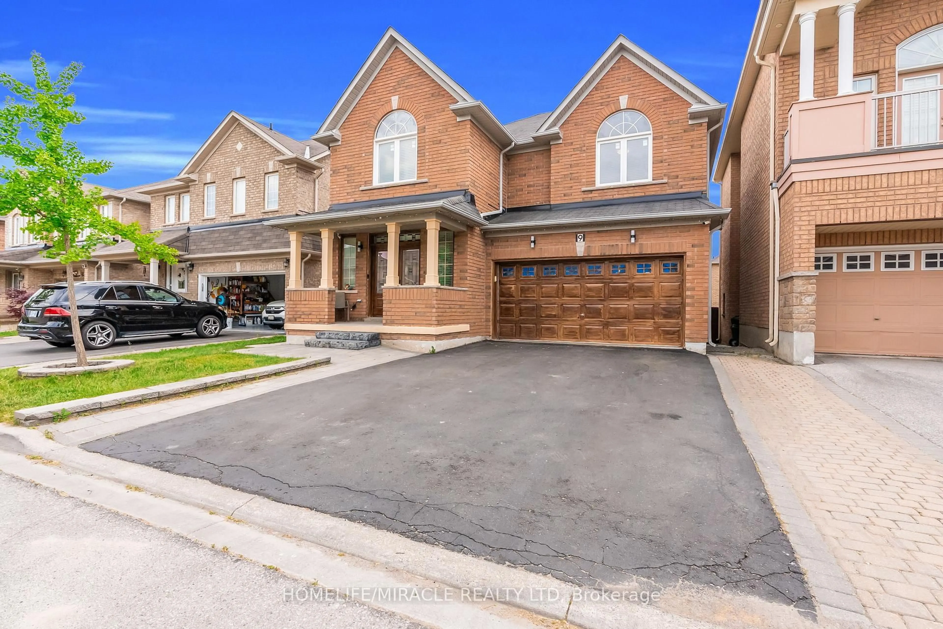 Home with brick exterior material, street for 9 Gamson Cres, Brampton Ontario L6R 0V7