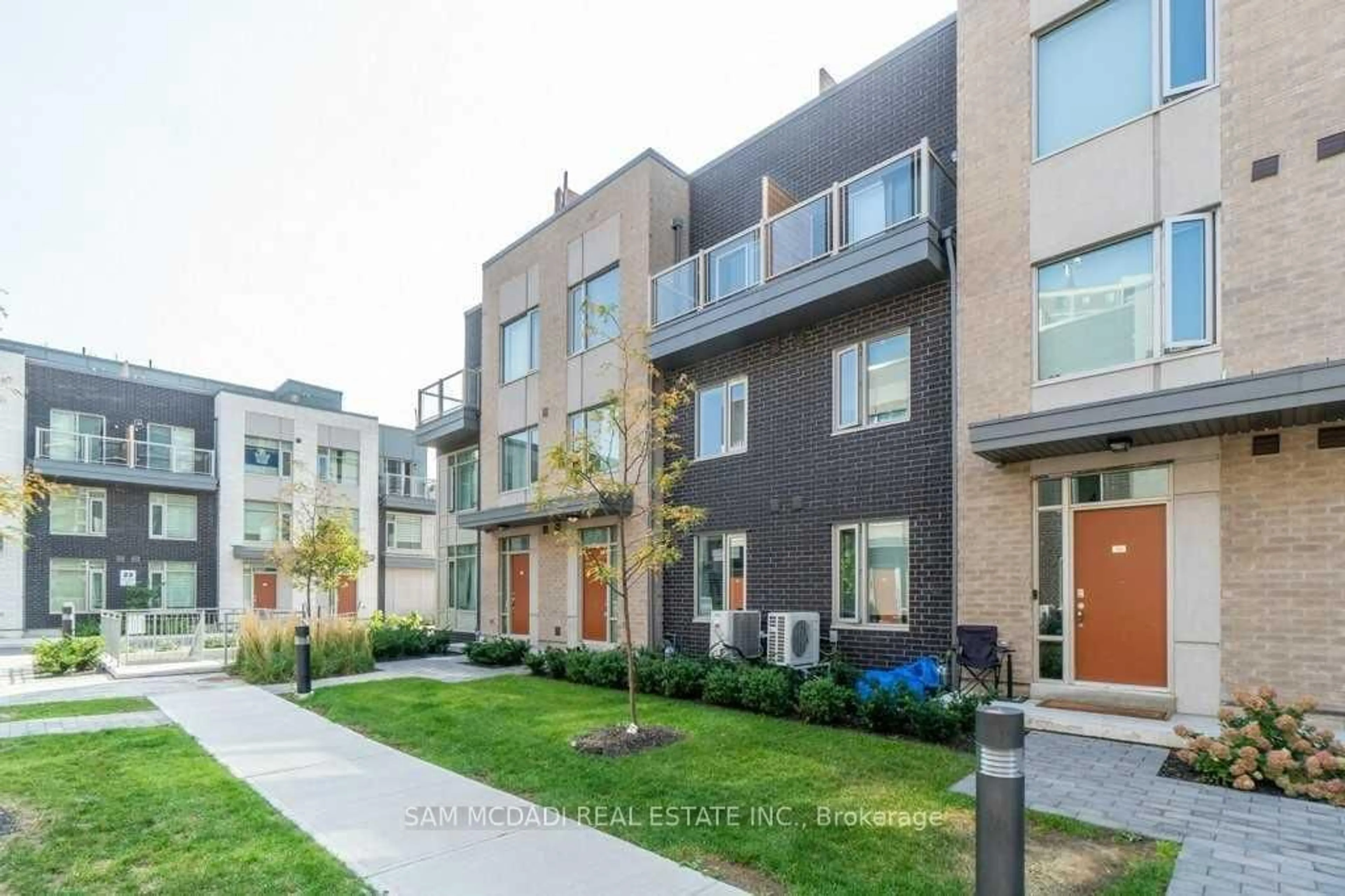Home with brick exterior material, street for 22 Applewood Lane #33, Toronto Ontario M9C 2Z7