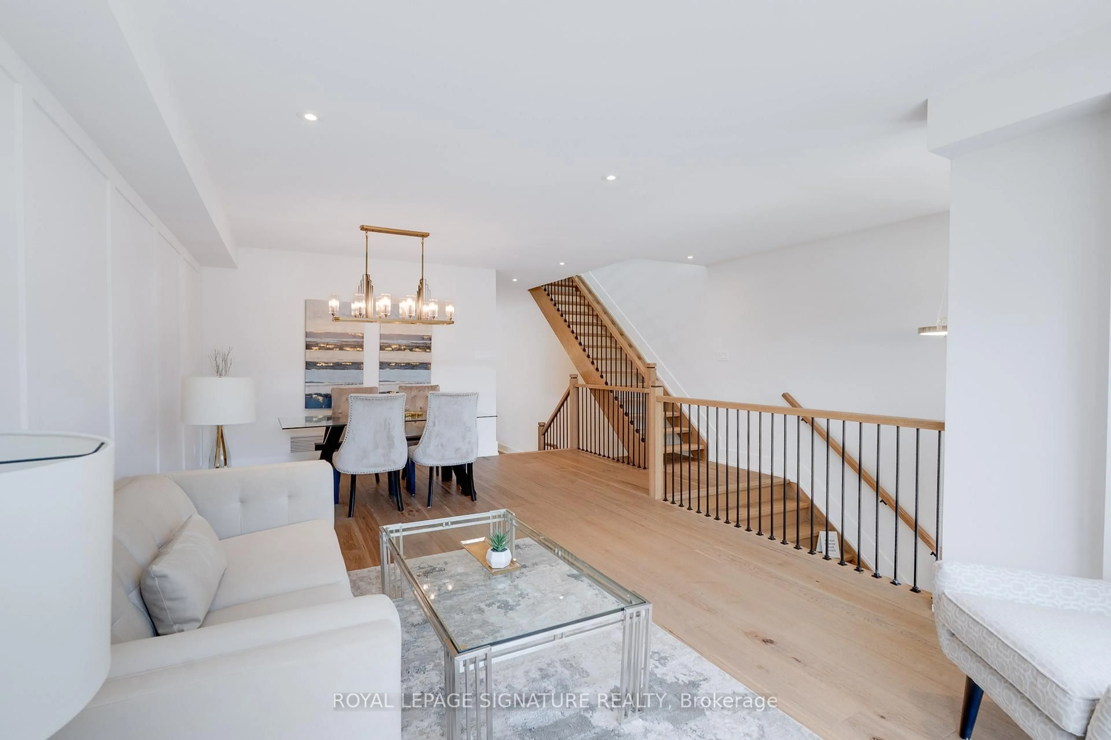 Living room with furniture, wood/laminate floor for 62 Ash Cres, Toronto Ontario M8W 1E6