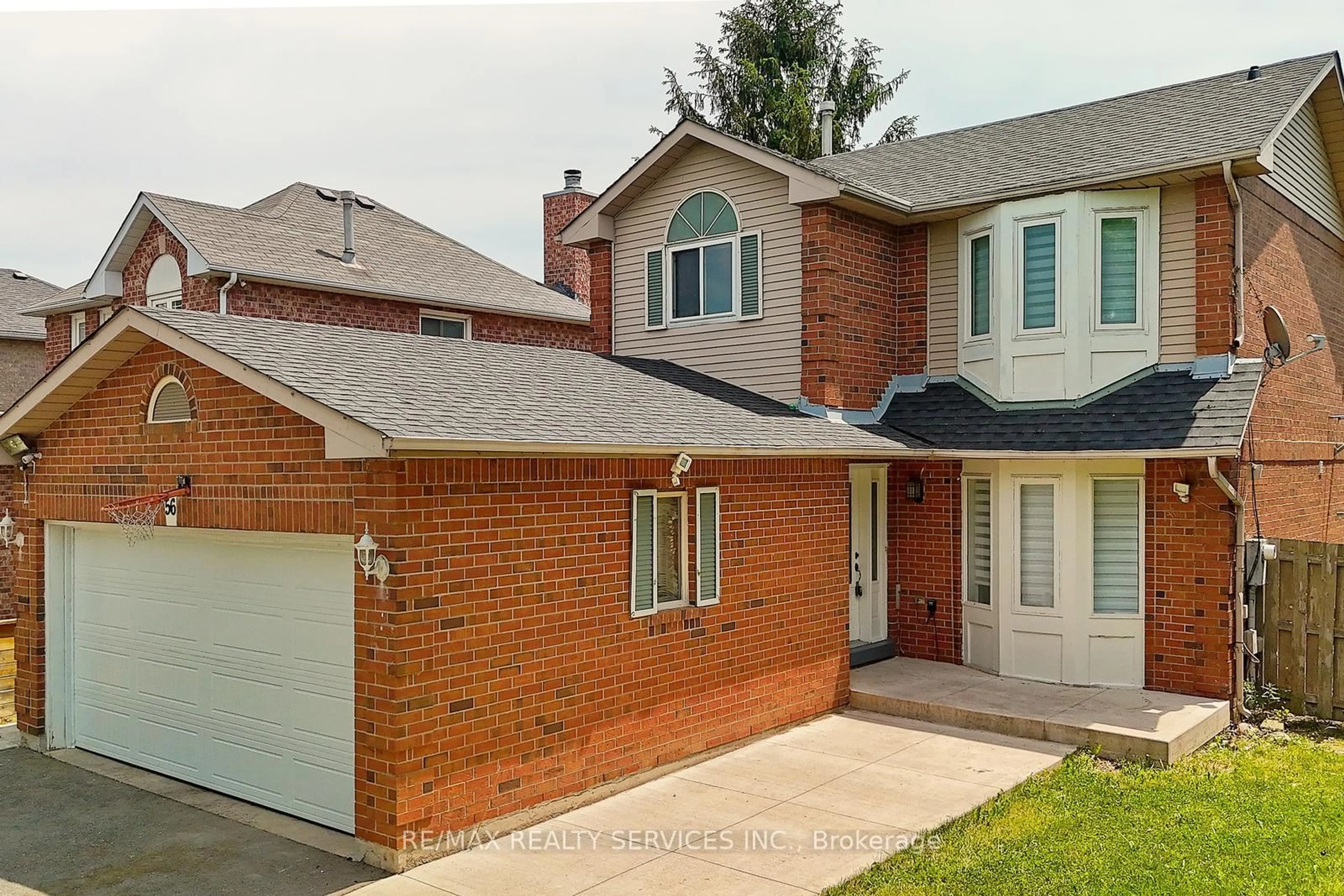 Home with brick exterior material, street for 56 Mullis Cres, Brampton Ontario L6Y 4T2