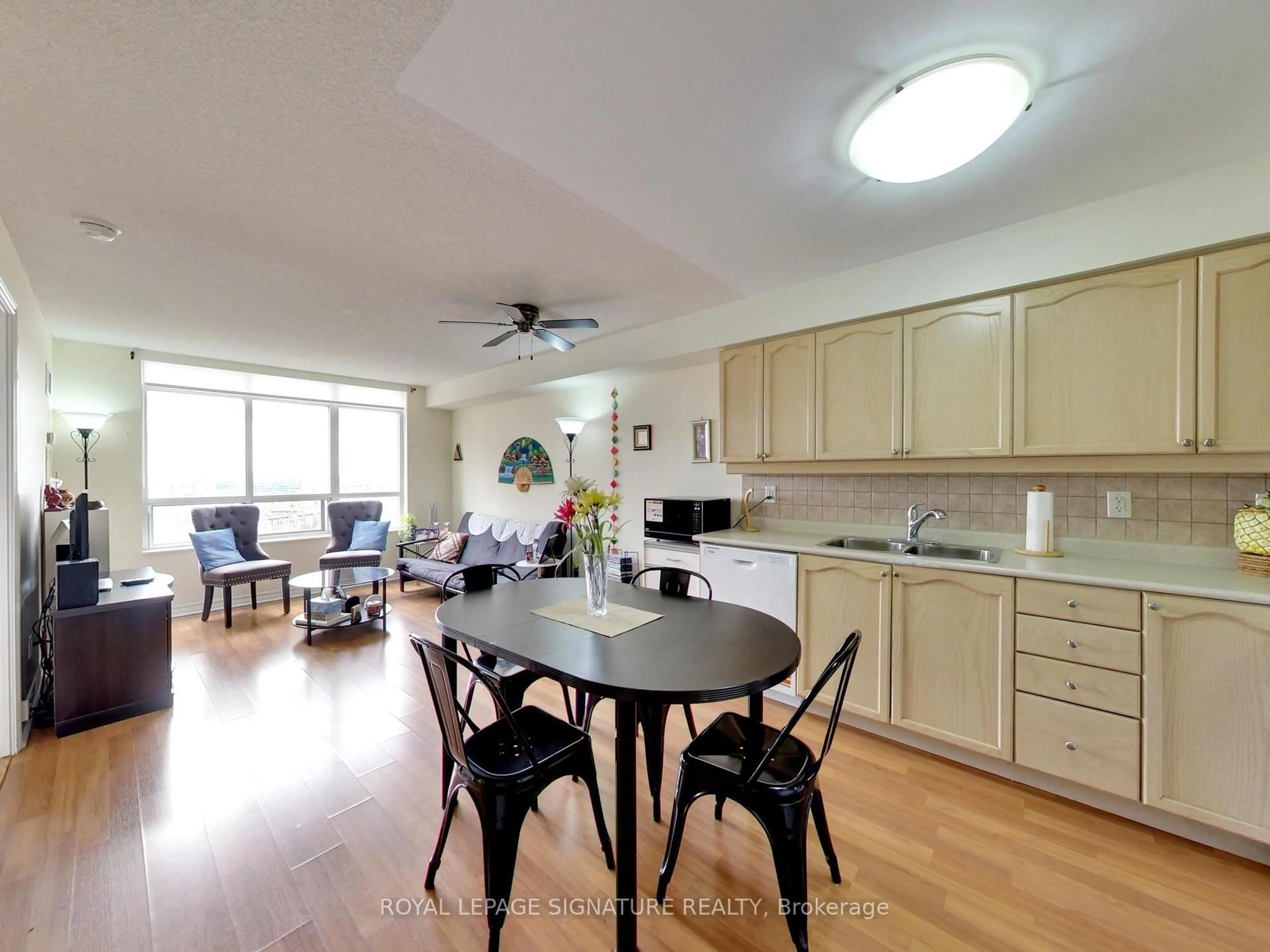 Open concept kitchen, wood/laminate floor for 710 Humberwood Blvd #2010, Toronto Ontario M9W 7J5