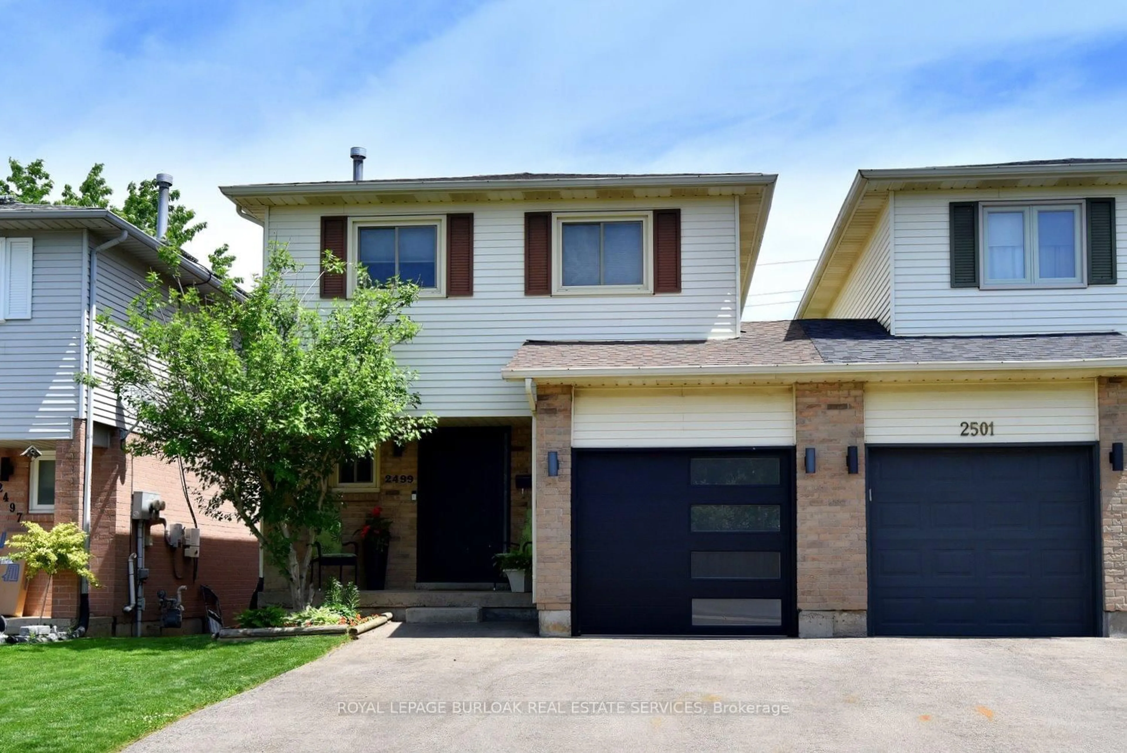 Home with brick exterior material, street for 2499 Whittaker Dr, Burlington Ontario L7P 4P9