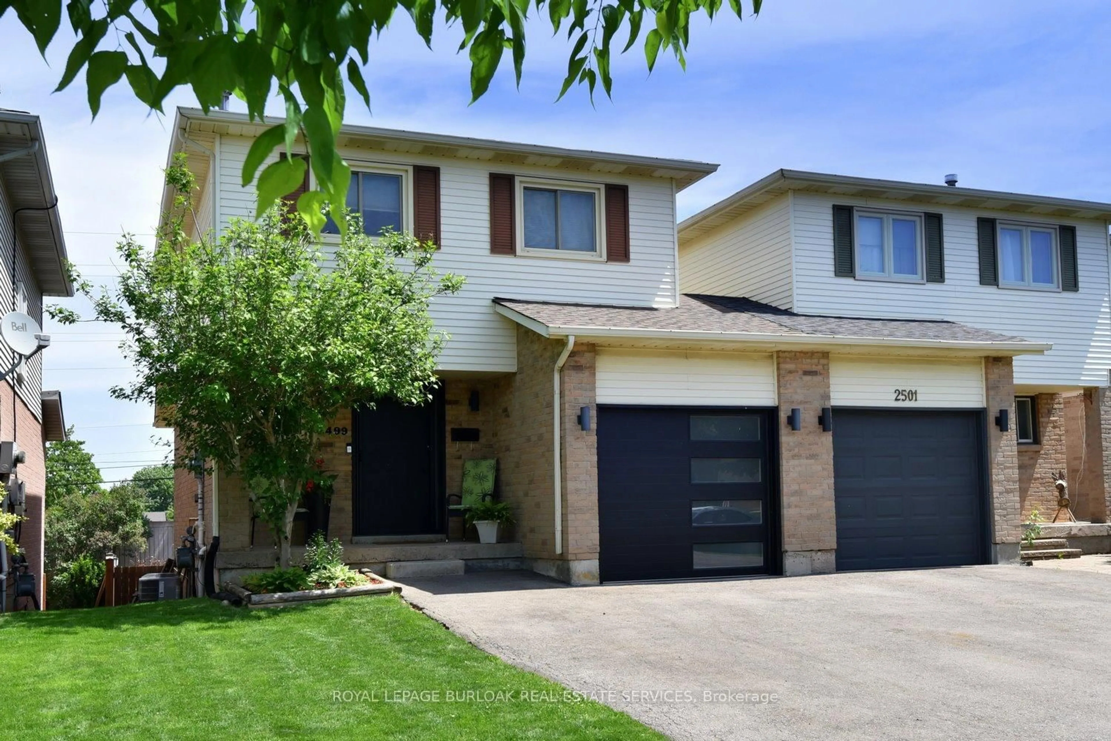Home with brick exterior material, street for 2499 Whittaker Dr, Burlington Ontario L7P 4P9