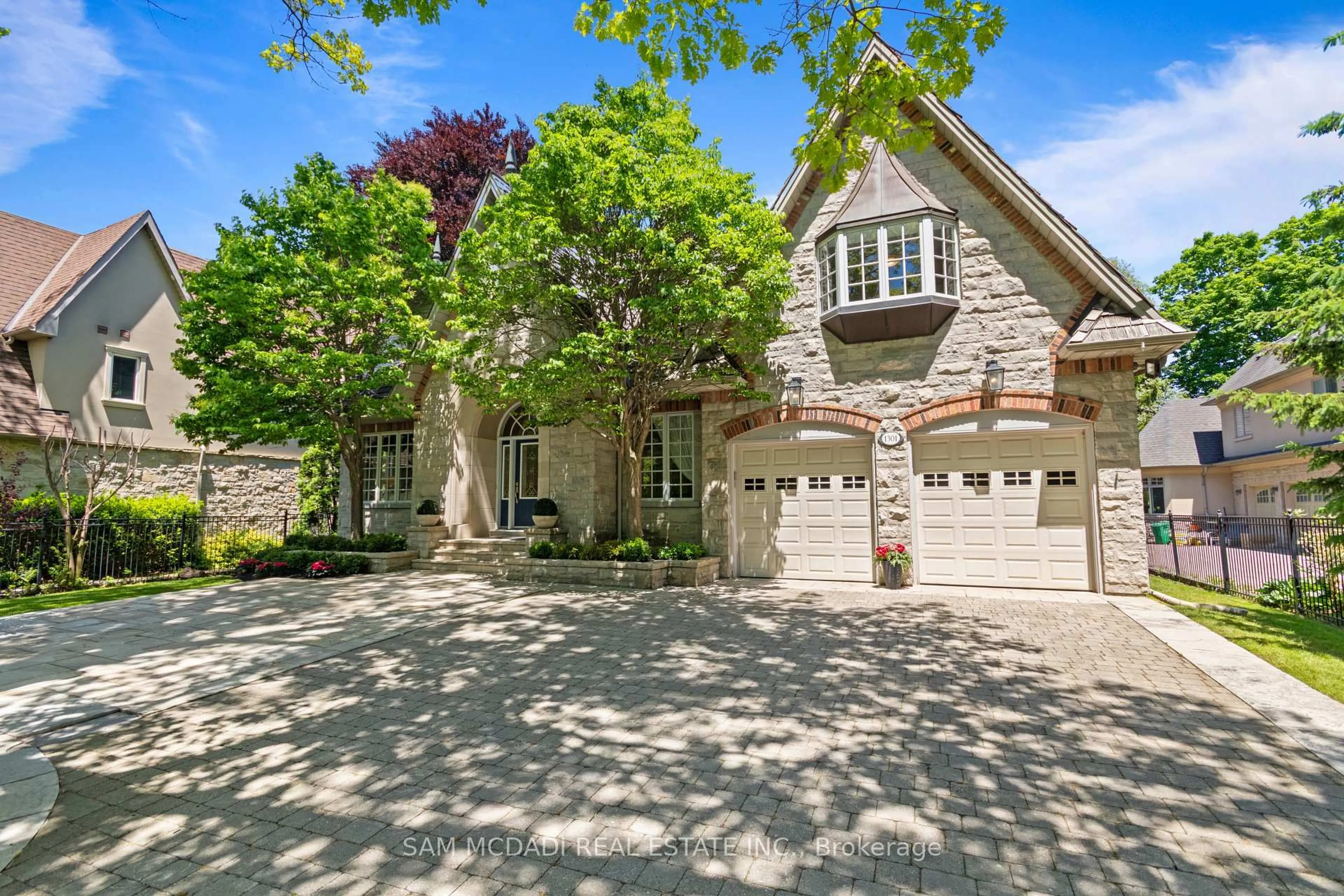 Home with brick exterior material, street for 1301 Mississauga Rd, Mississauga Ontario L5H 2J1