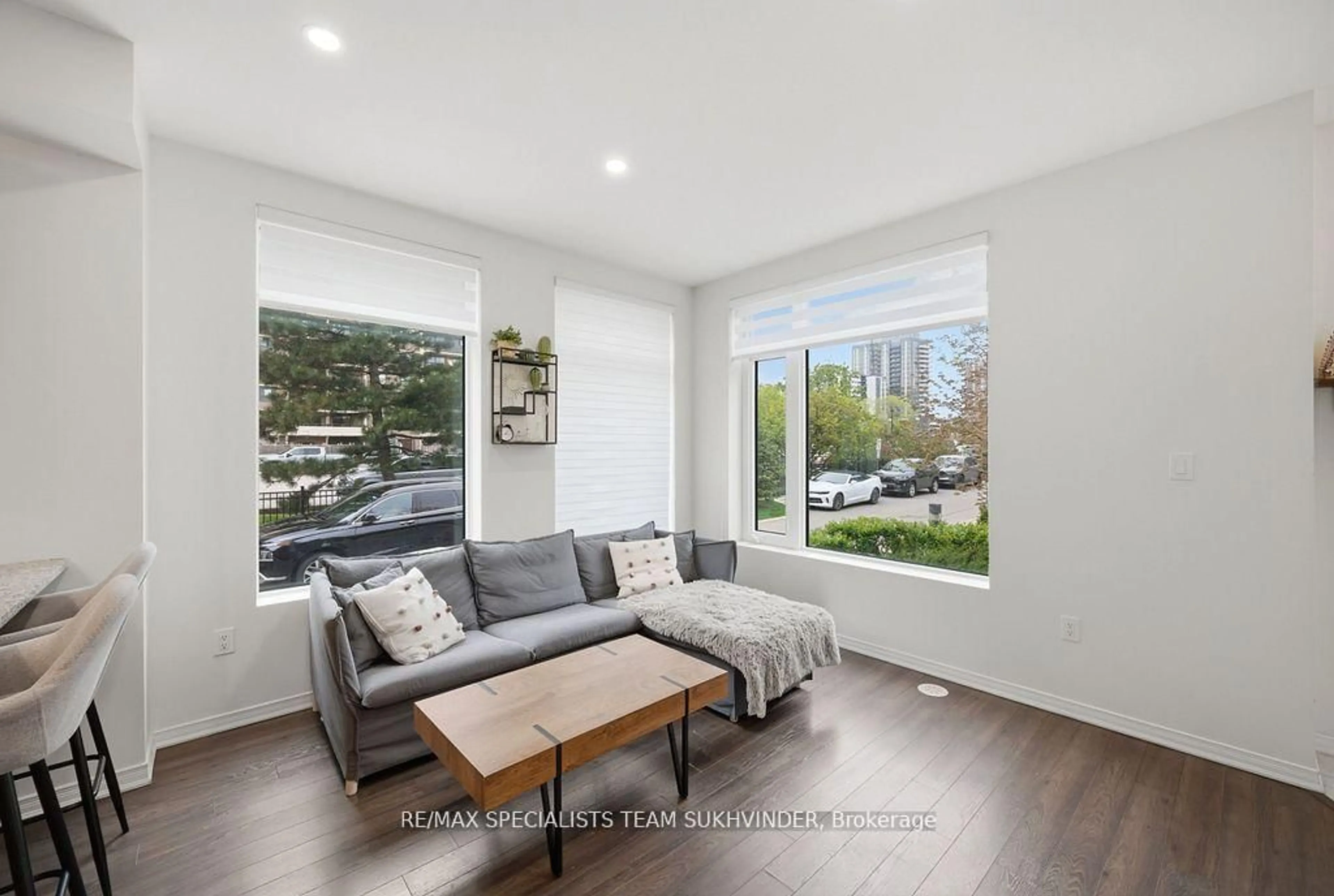 Living room with furniture, unknown for 18 Applewood Lane #25, Toronto Ontario M9C 0C1