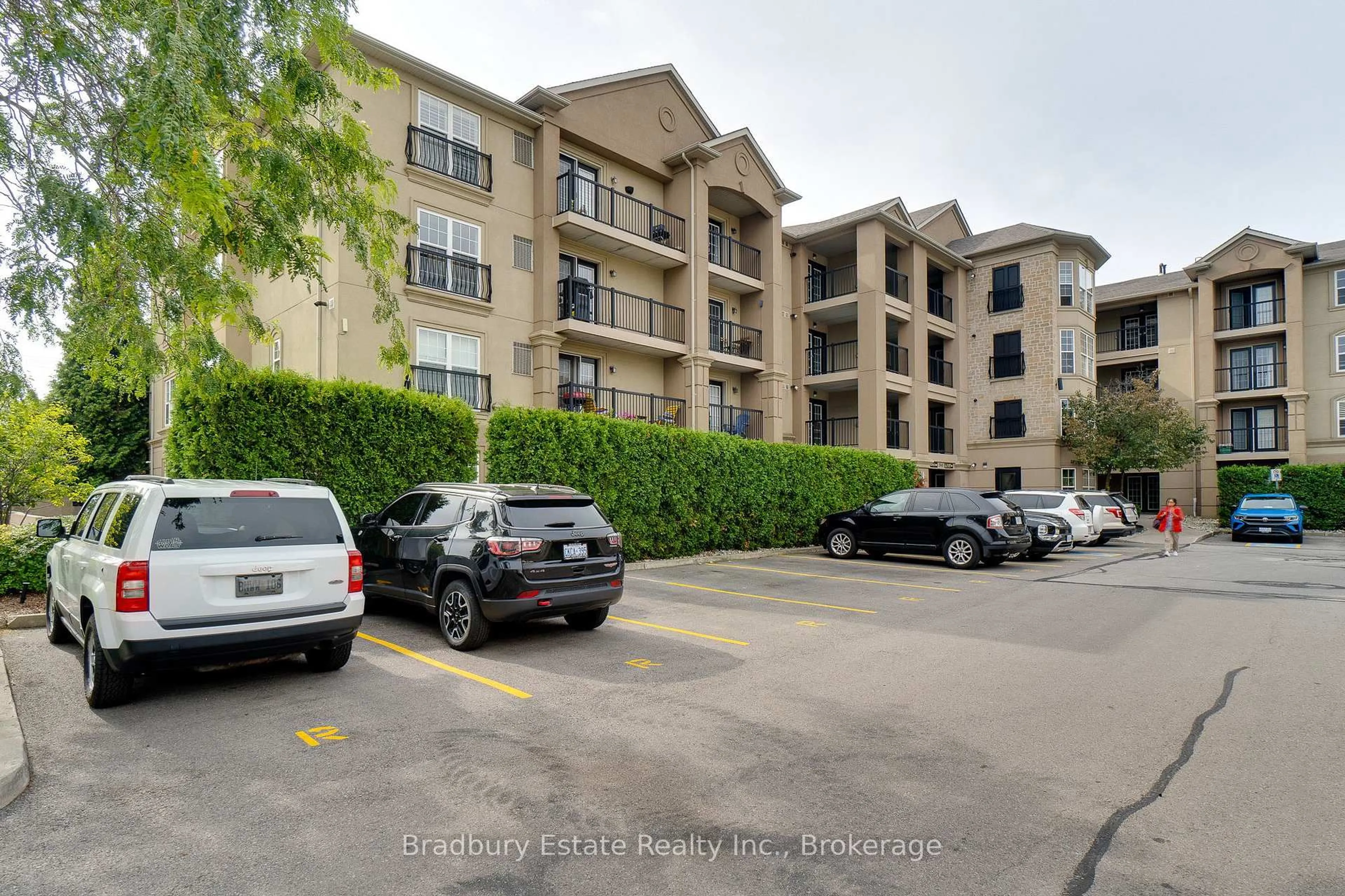 A pic from outside/outdoor area/front of a property/back of a property/a pic from drone, street for 2045 Appleby Line #305, Burlington Ontario L7L 7G9