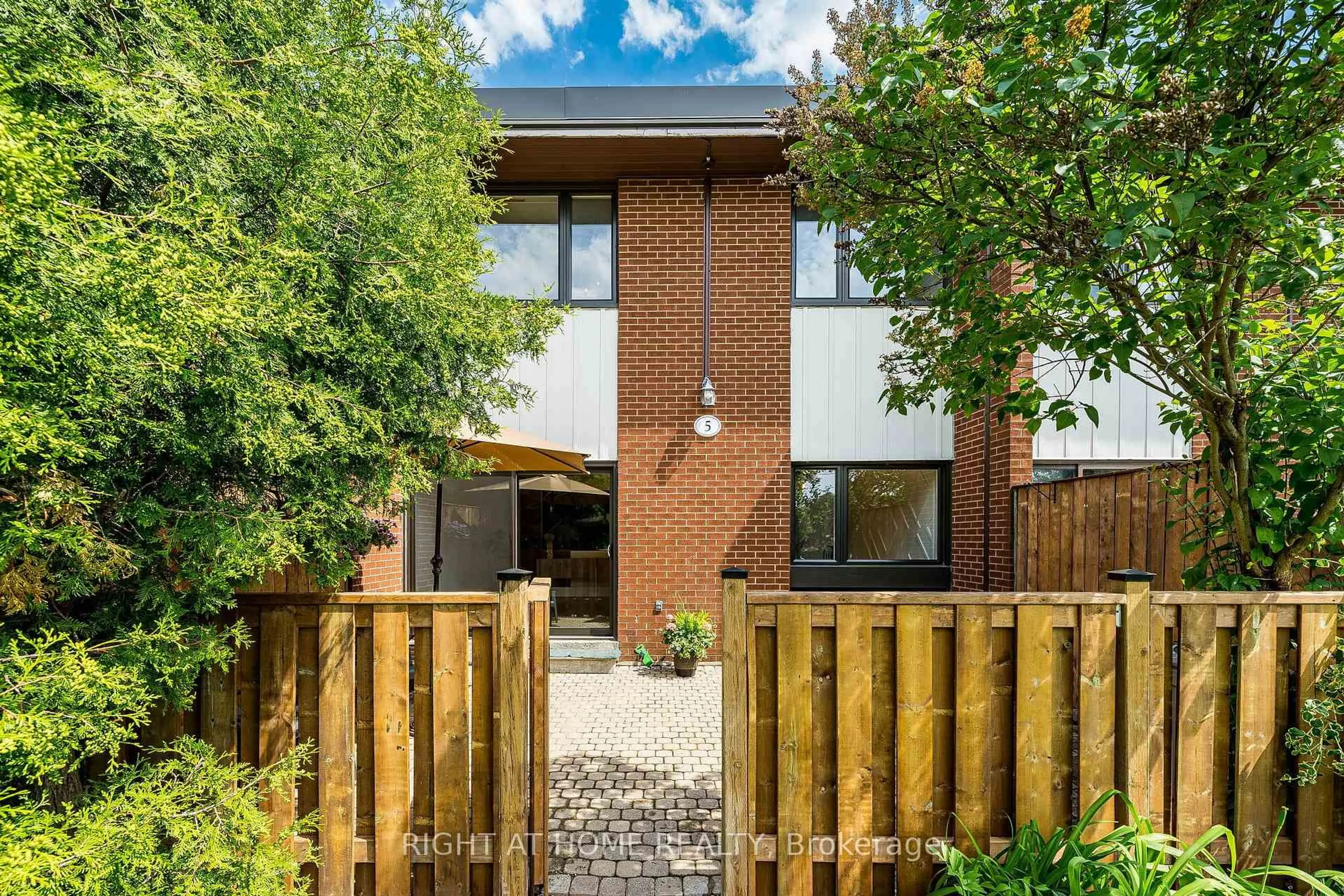 Home with brick exterior material, street for 1200 Gripsholm Rd ##5, Mississauga Ontario L4Y 2G9