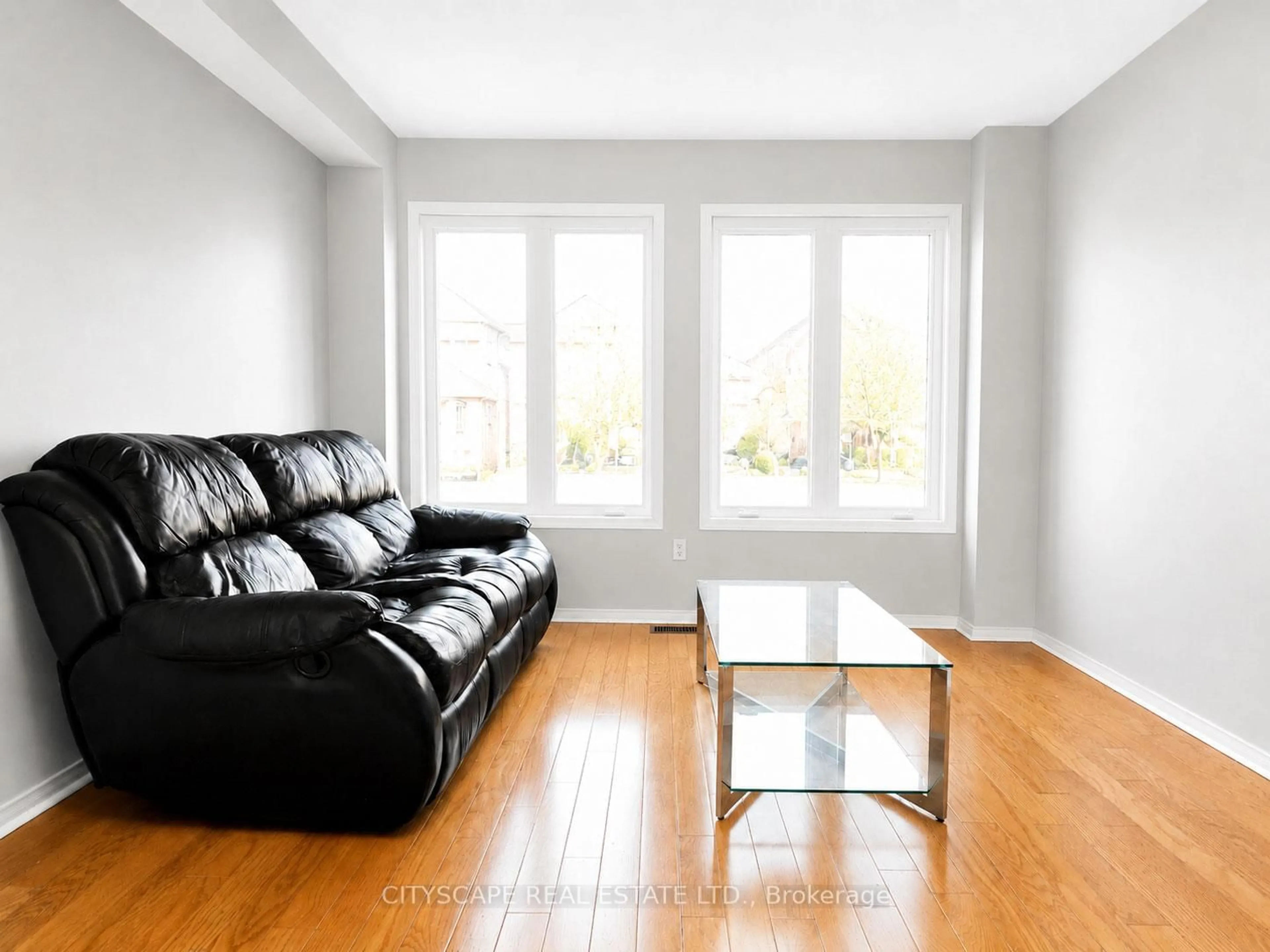 Living room with furniture, wood/laminate floor for 29 Centrepark Dr, Toronto Ontario M6M 5K3