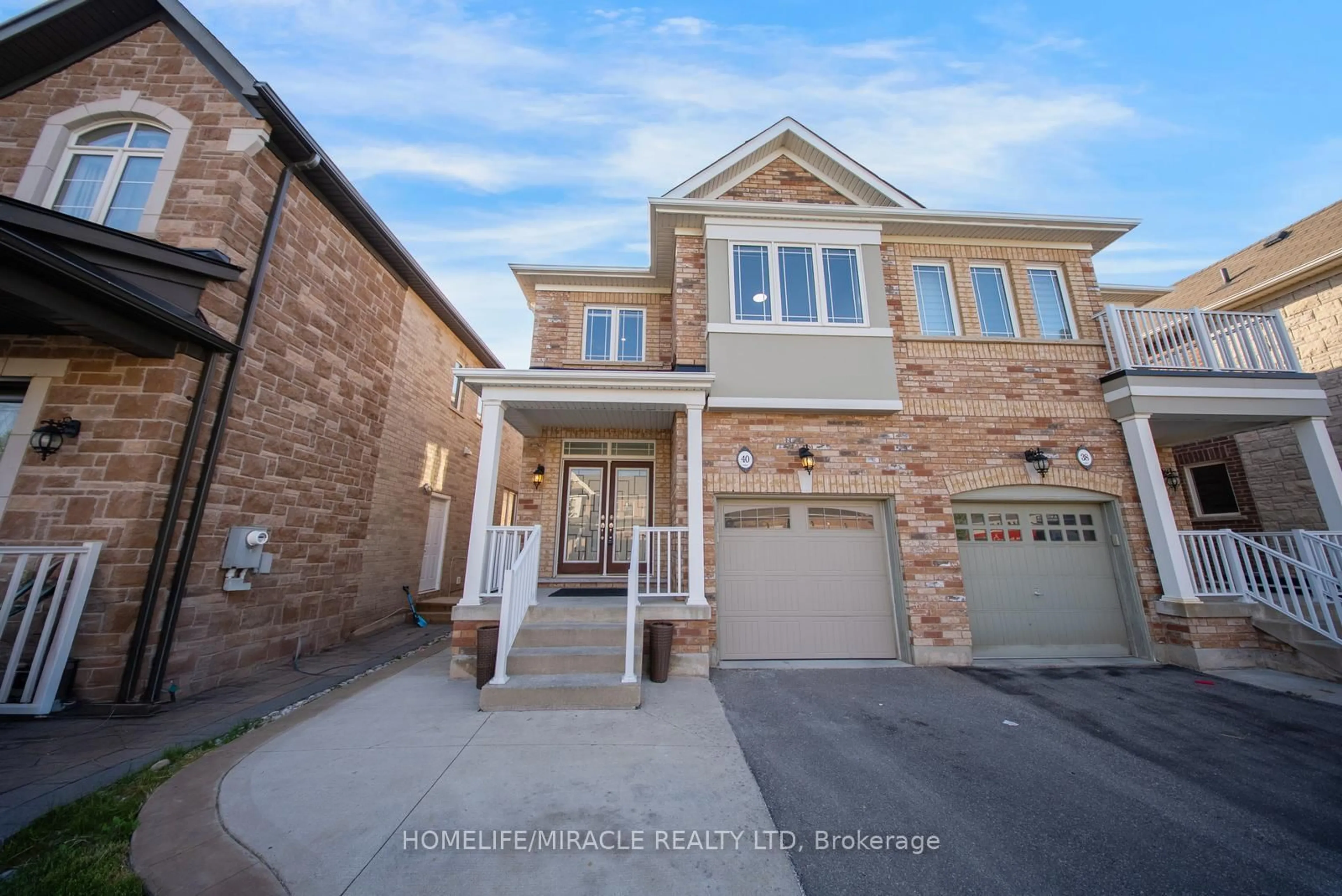 Home with brick exterior material, street for 40 Swanton Rd, Brampton Ontario L6X 0Y9