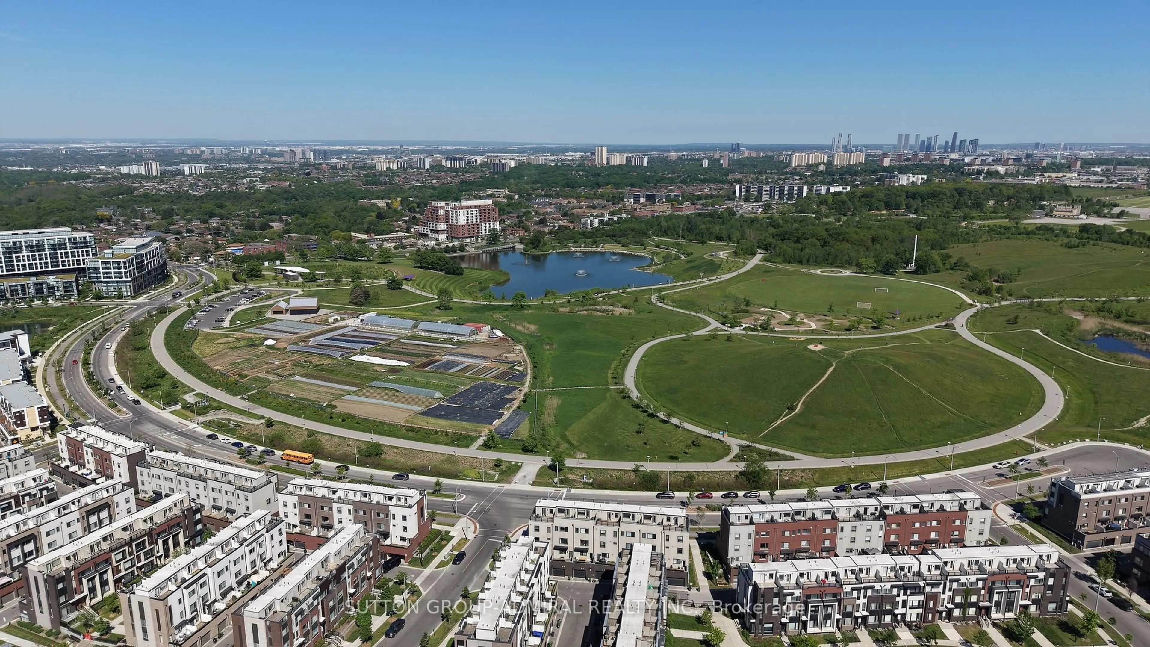 A pic from outside/outdoor area/front of a property/back of a property/a pic from drone, water/lake/river/ocean view for 153 William Duncan Rd #3, Toronto Ontario M3K 0B9