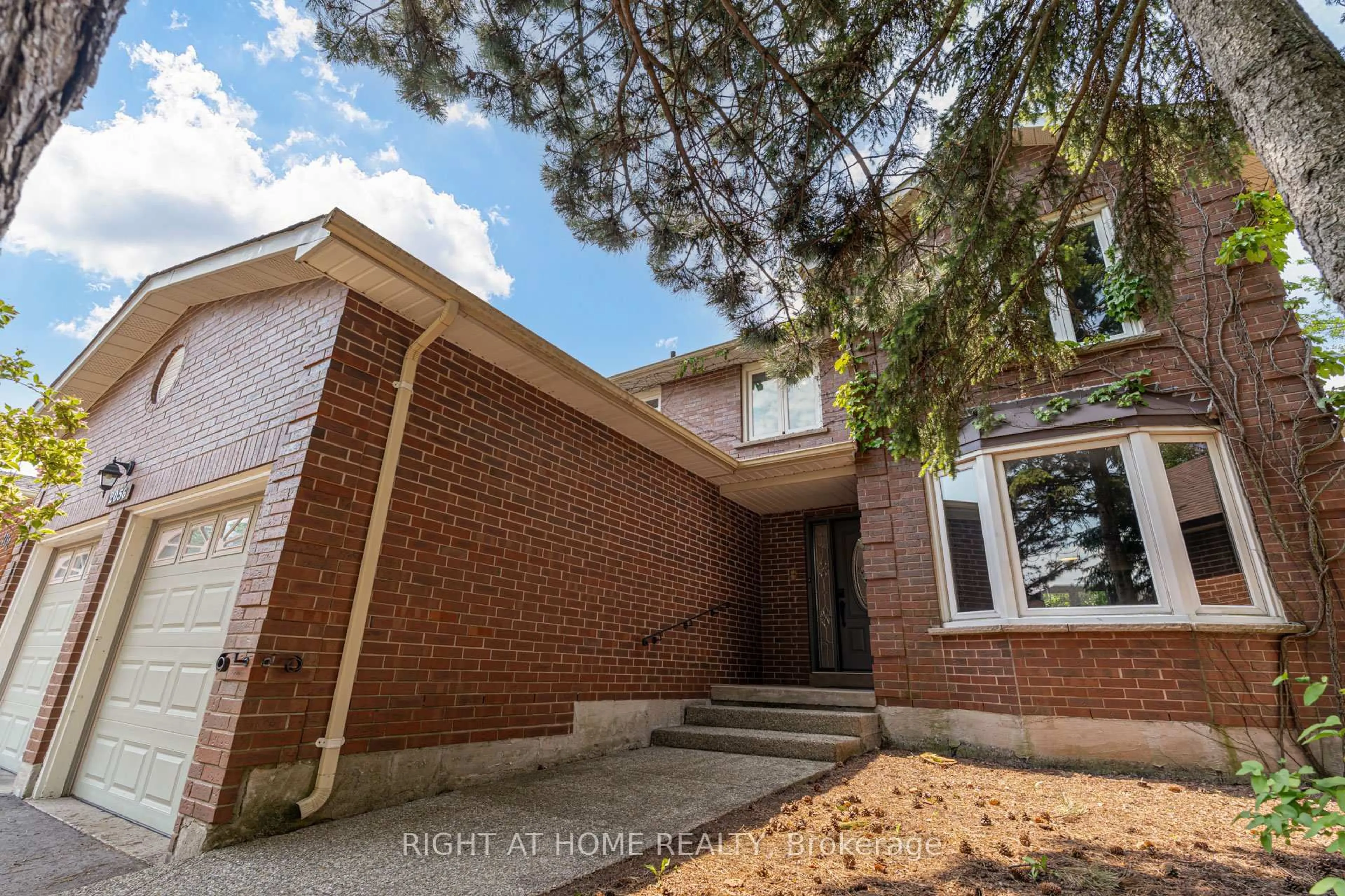 Home with brick exterior material, street for 2056 Madden Blvd, Oakville Ontario L6H 3L6
