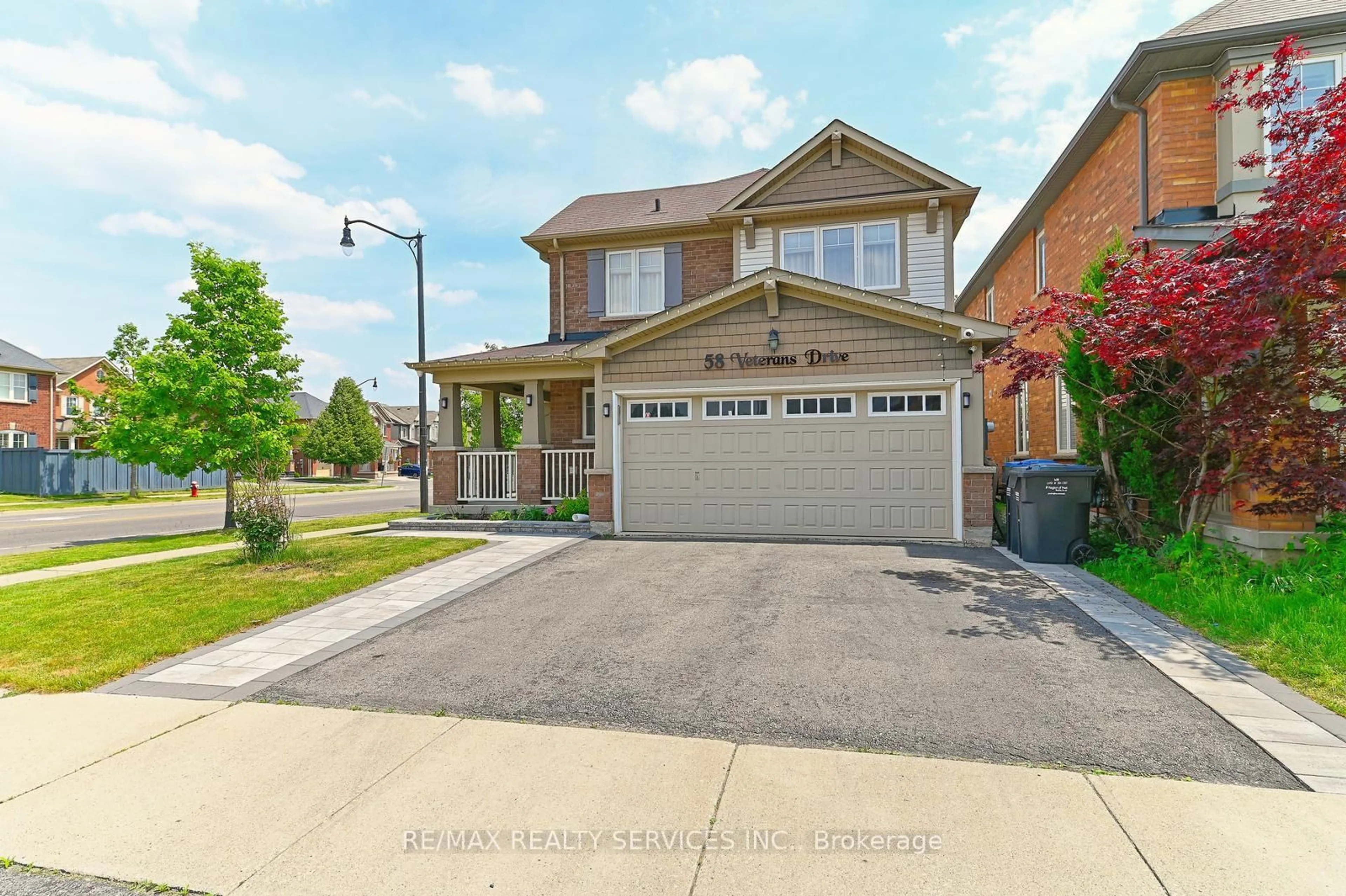 Home with brick exterior material, street for 58 Veterans Dr, Brampton Ontario L7A 0T7
