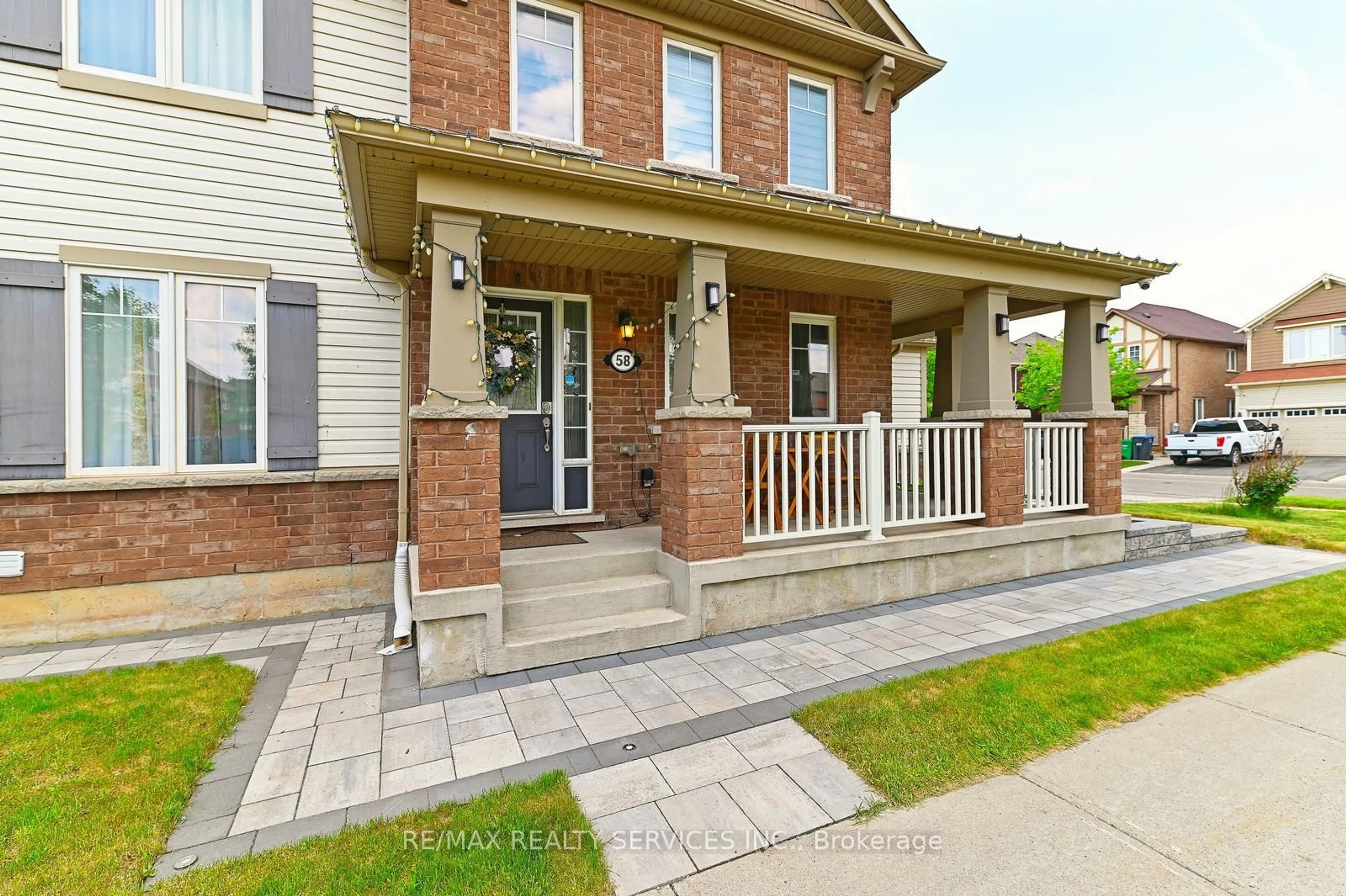 Home with brick exterior material, street for 58 Veterans Dr, Brampton Ontario L7A 0T7