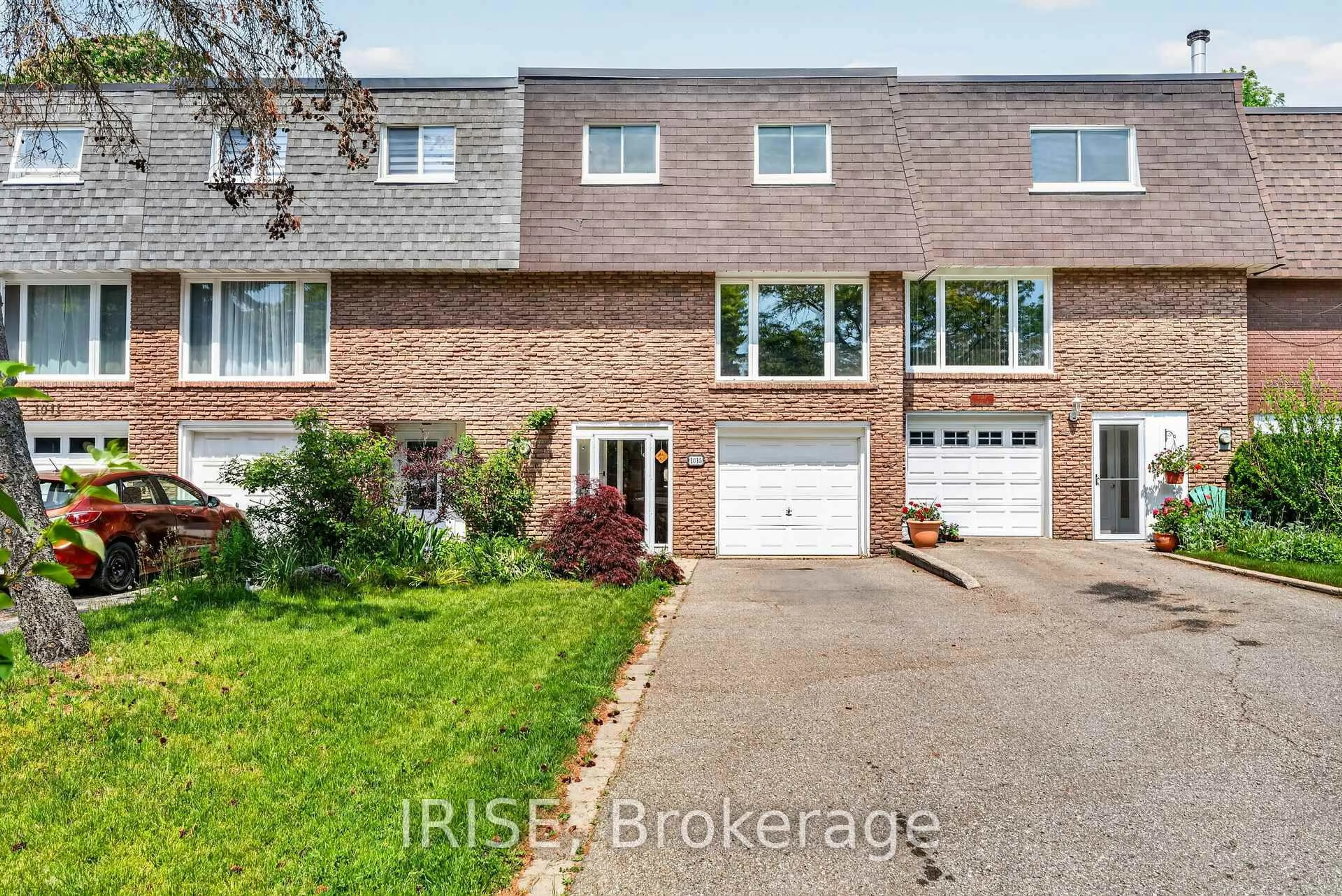Home with brick exterior material, street for 1015 Falgarwood Dr, Oakville Ontario L6H 1N7