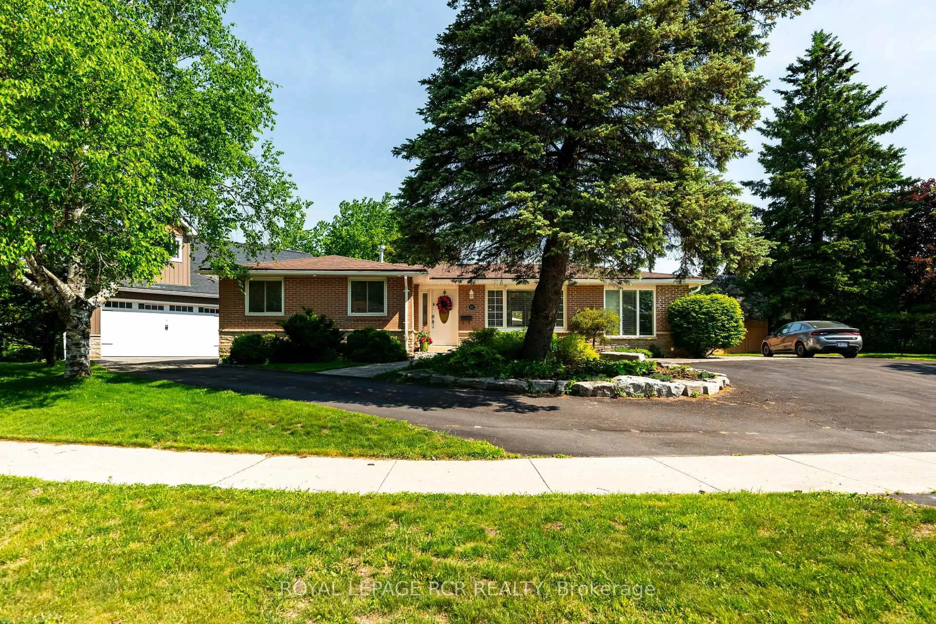 Home with brick exterior material, street for 52 Maple Cres, Orangeville Ontario L9W 1X7