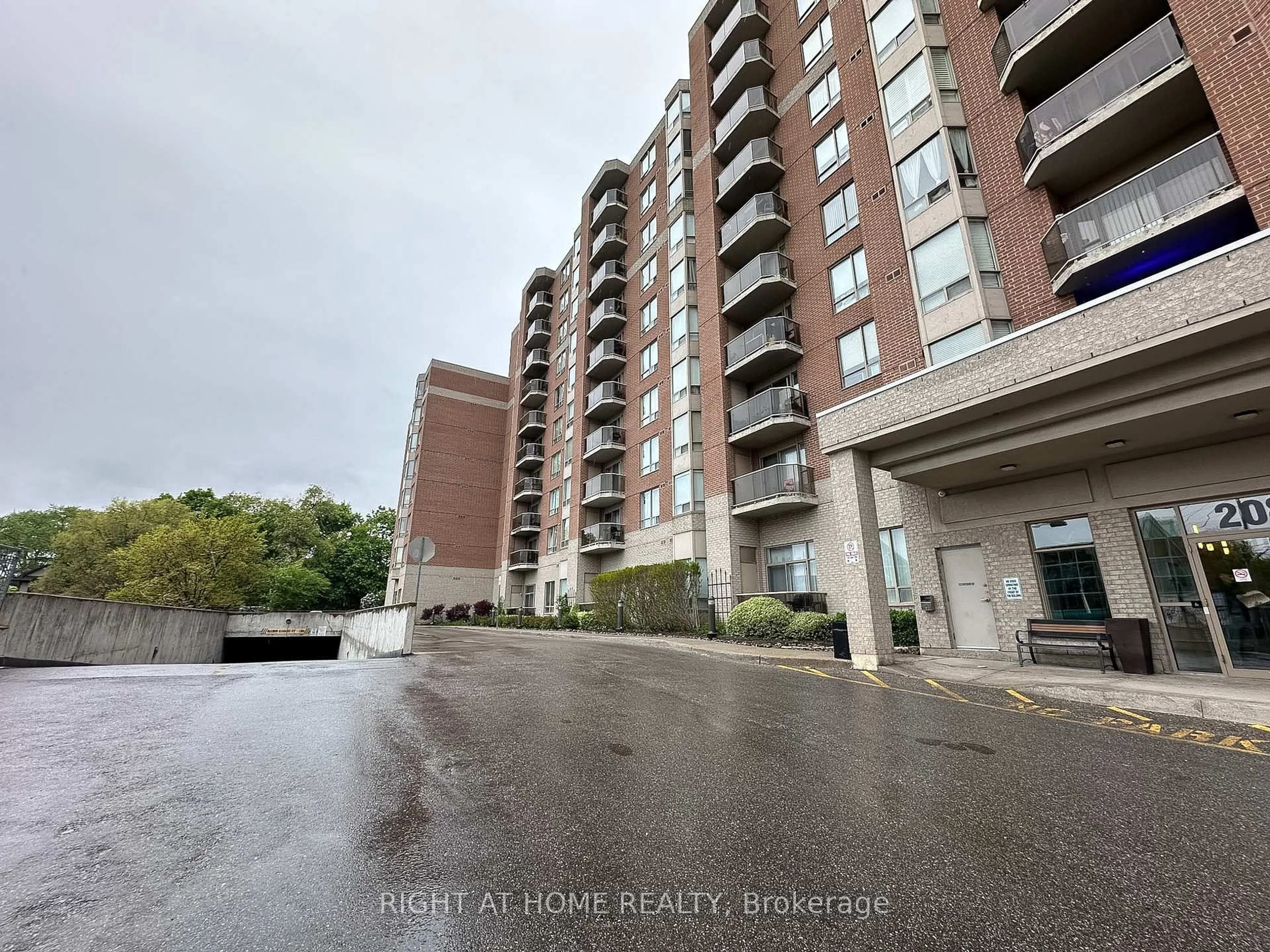 A pic from outside/outdoor area/front of a property/back of a property/a pic from drone, water/lake/river/ocean view for 2088 Lawrence Ave #702, Toronto Ontario M9N 3Z9