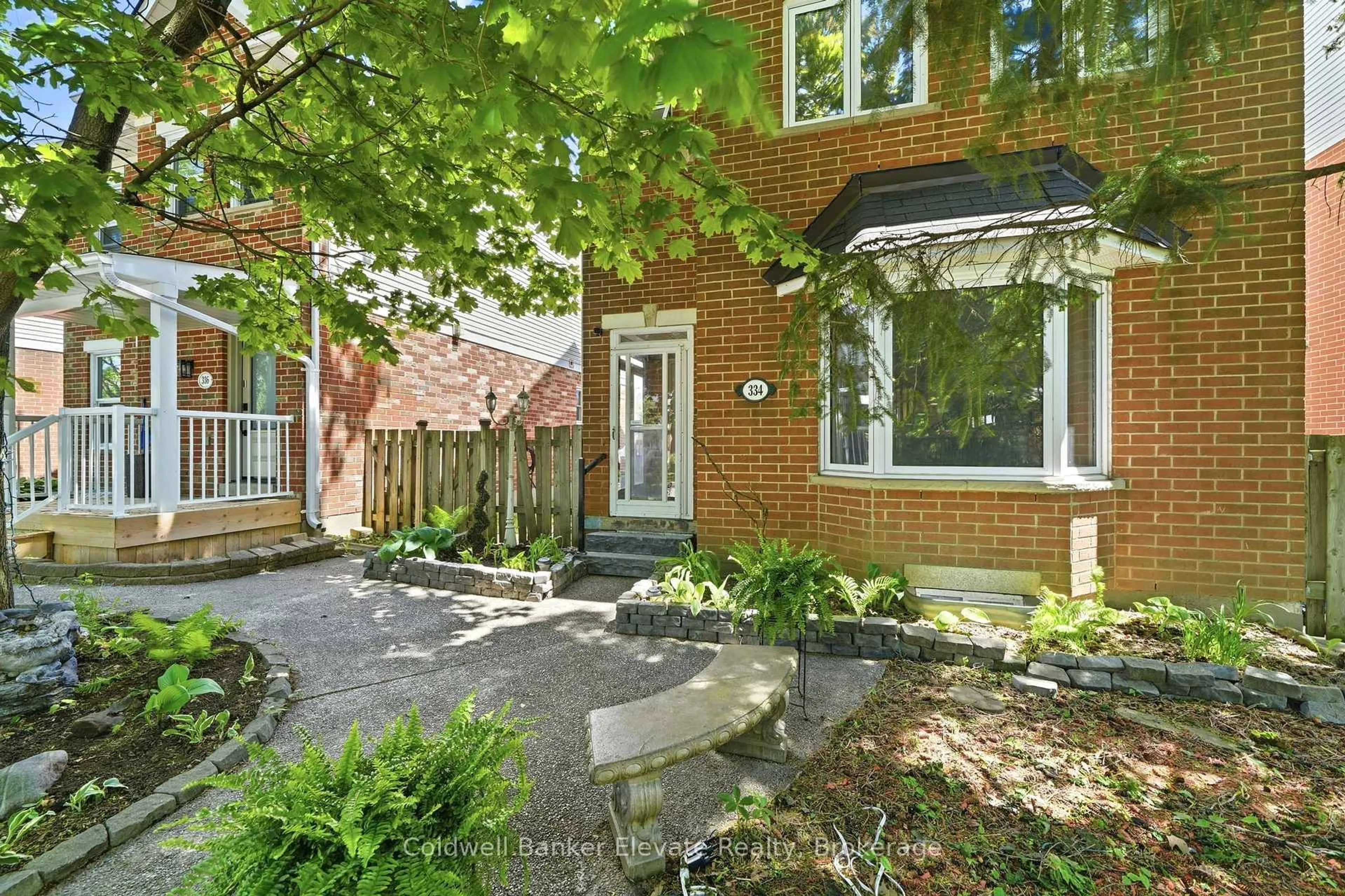 Home with brick exterior material, street for 334 Cottonwood St, Orangeville Ontario L9W 4X7