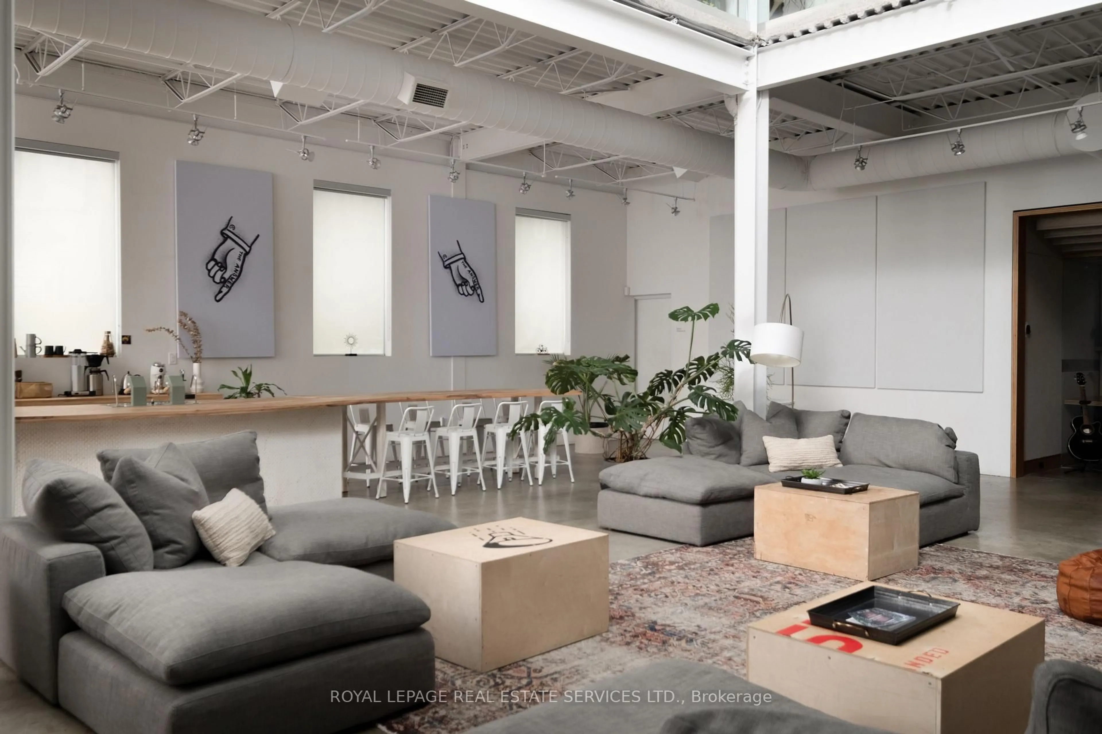 Living room with furniture, cement floor for 1 Roof Garden Lane, Toronto Ontario M6H 1R2
