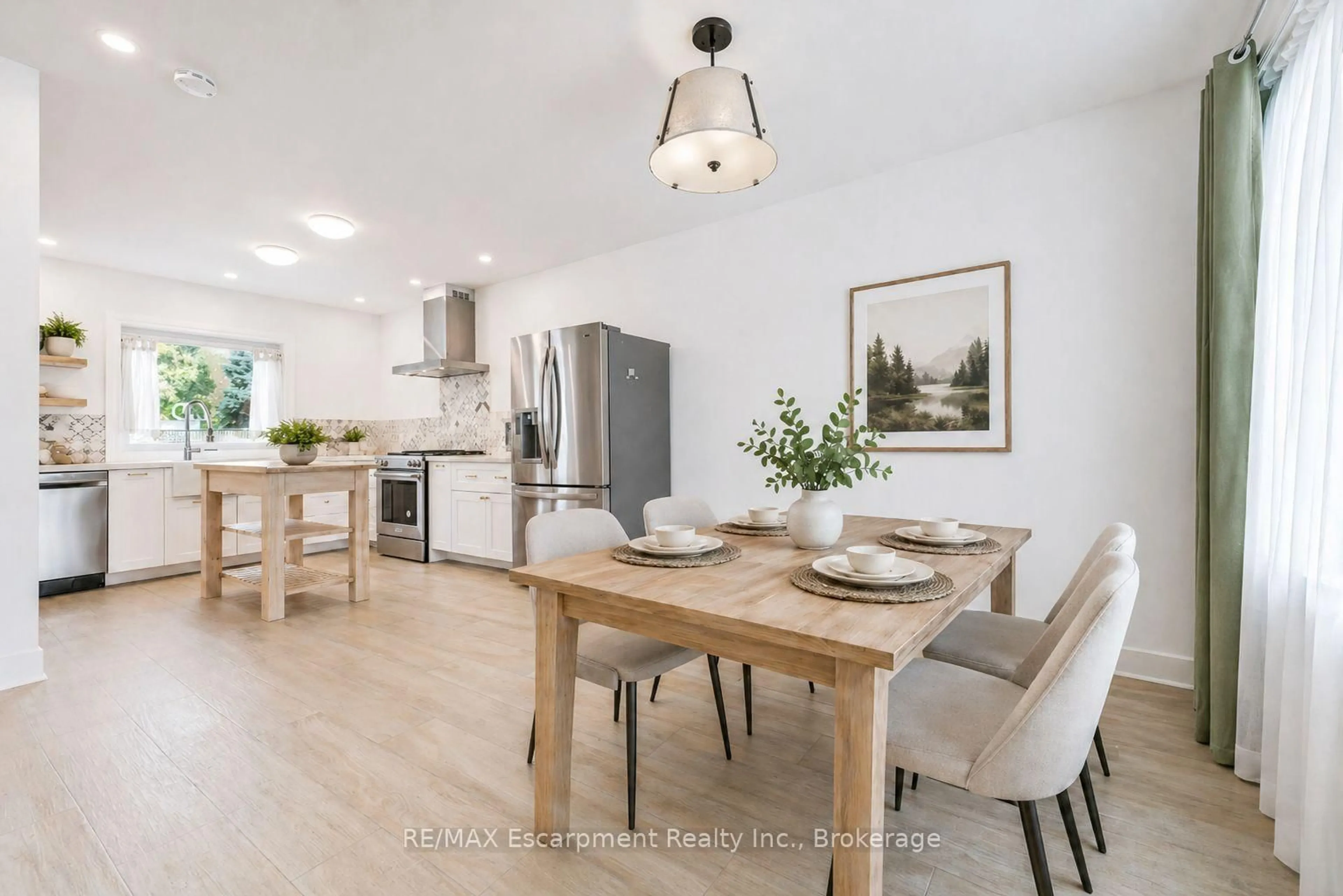 Open concept kitchen, wood/laminate floor for 227 Martindale Ave, Oakville Ontario L6H 4K2