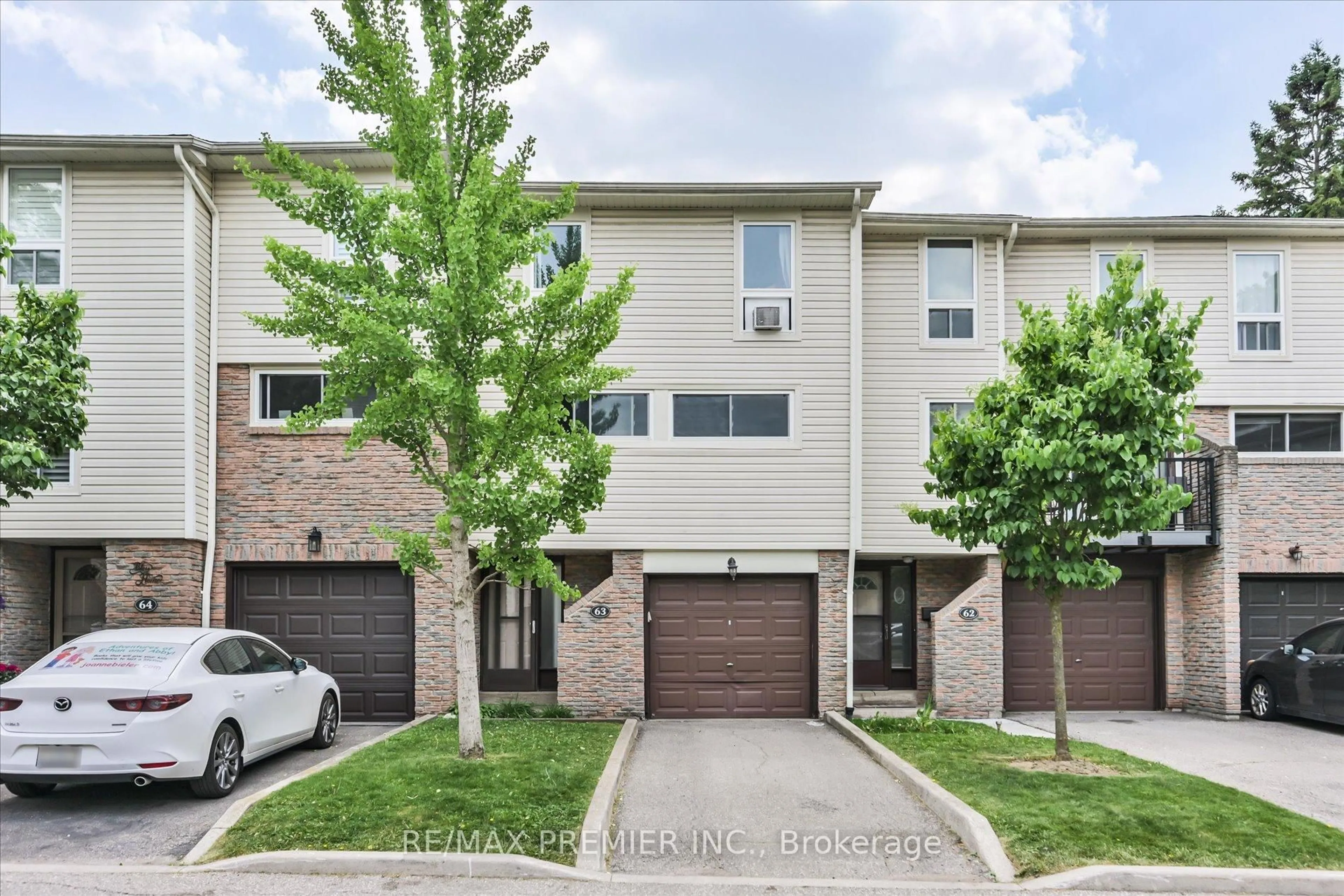 Home with brick exterior material, street for 7251 Copenhagen Rd #63, Mississauga Ontario L5N 2H6