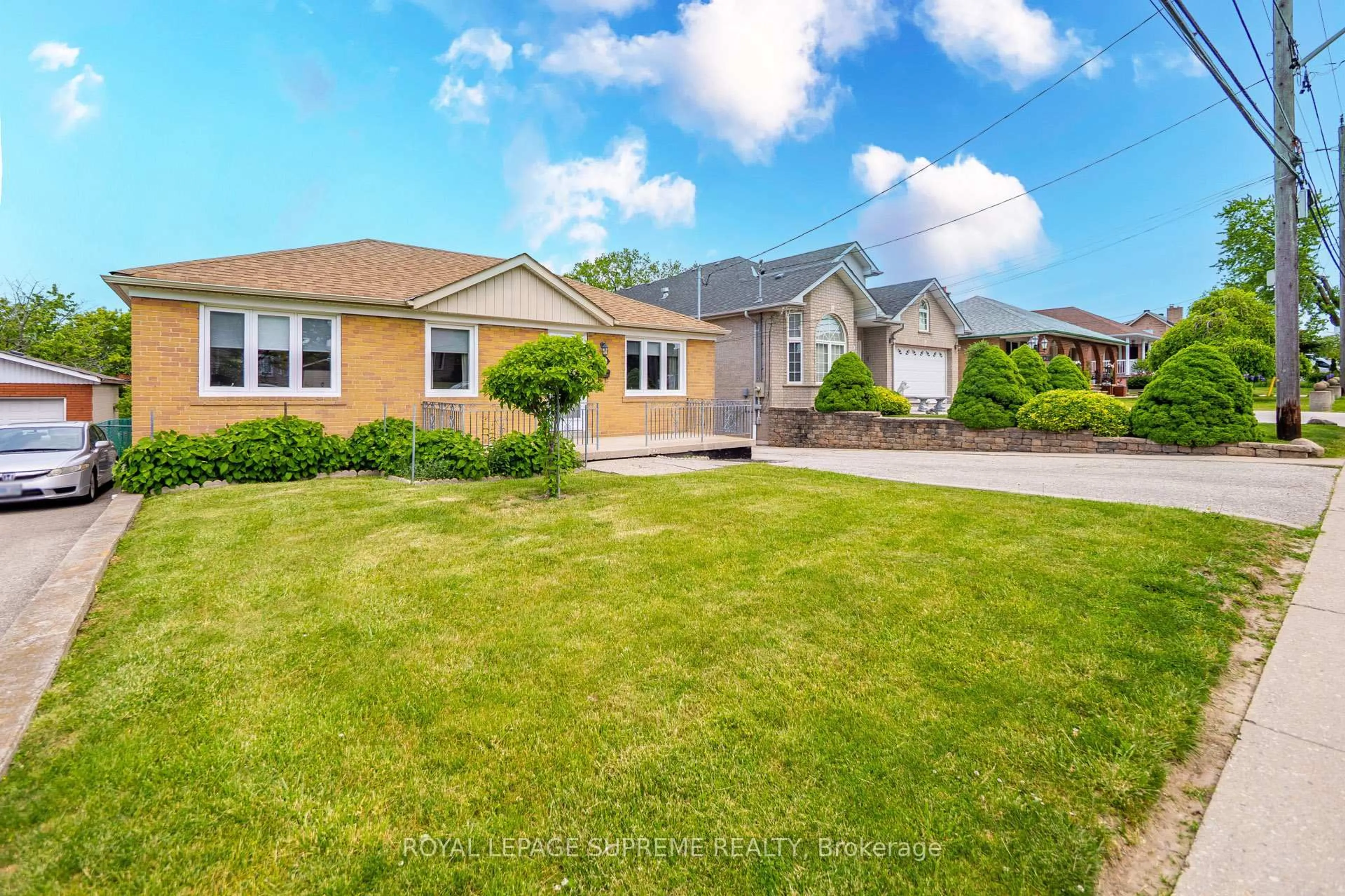 A pic from outside/outdoor area/front of a property/back of a property/a pic from drone, street for 376 Rustic Rd, Toronto Ontario M6L 1W7