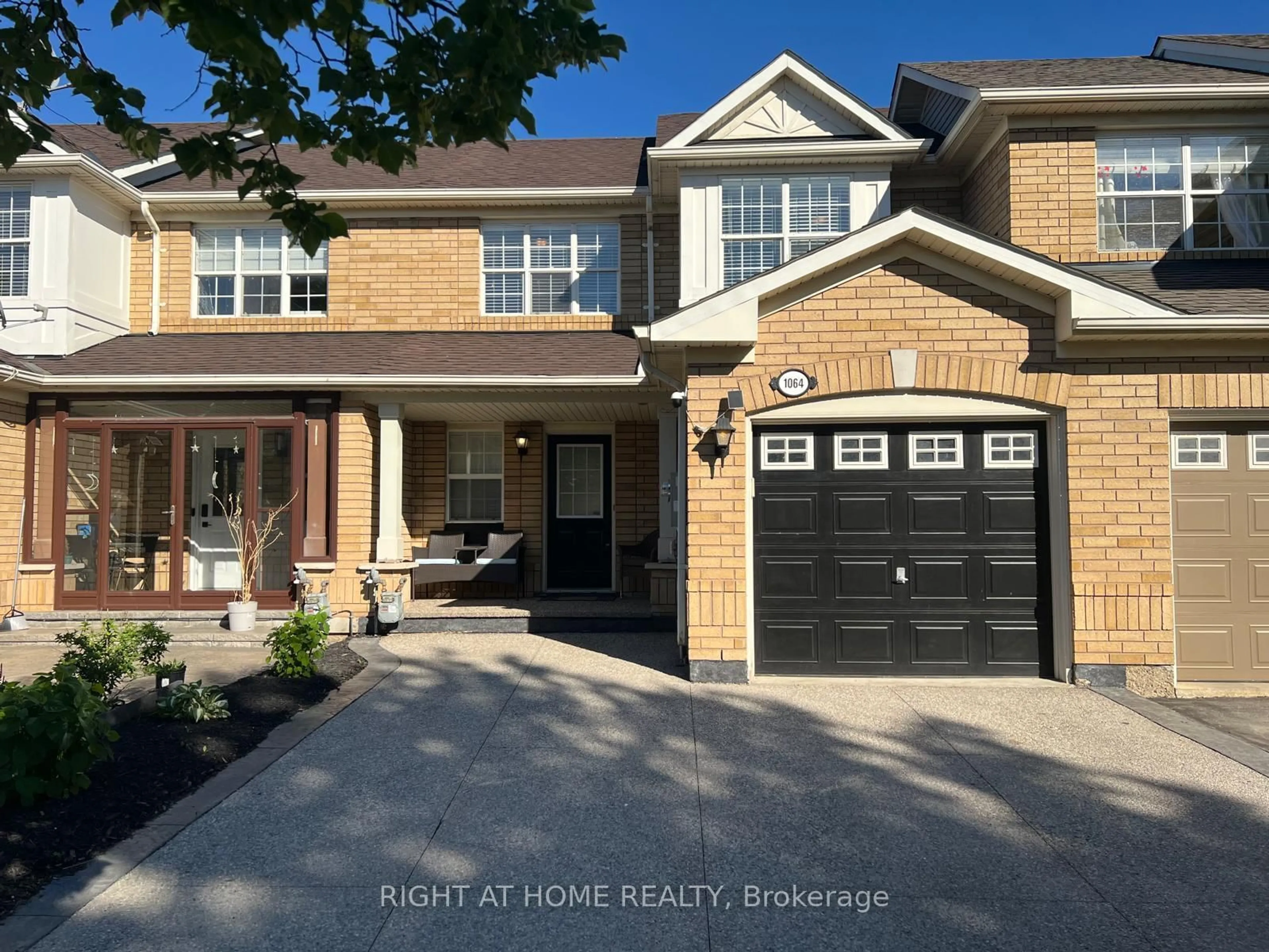 Home with brick exterior material, street for 1064 BARCLAY Circ, Milton Ontario L9T 5W3