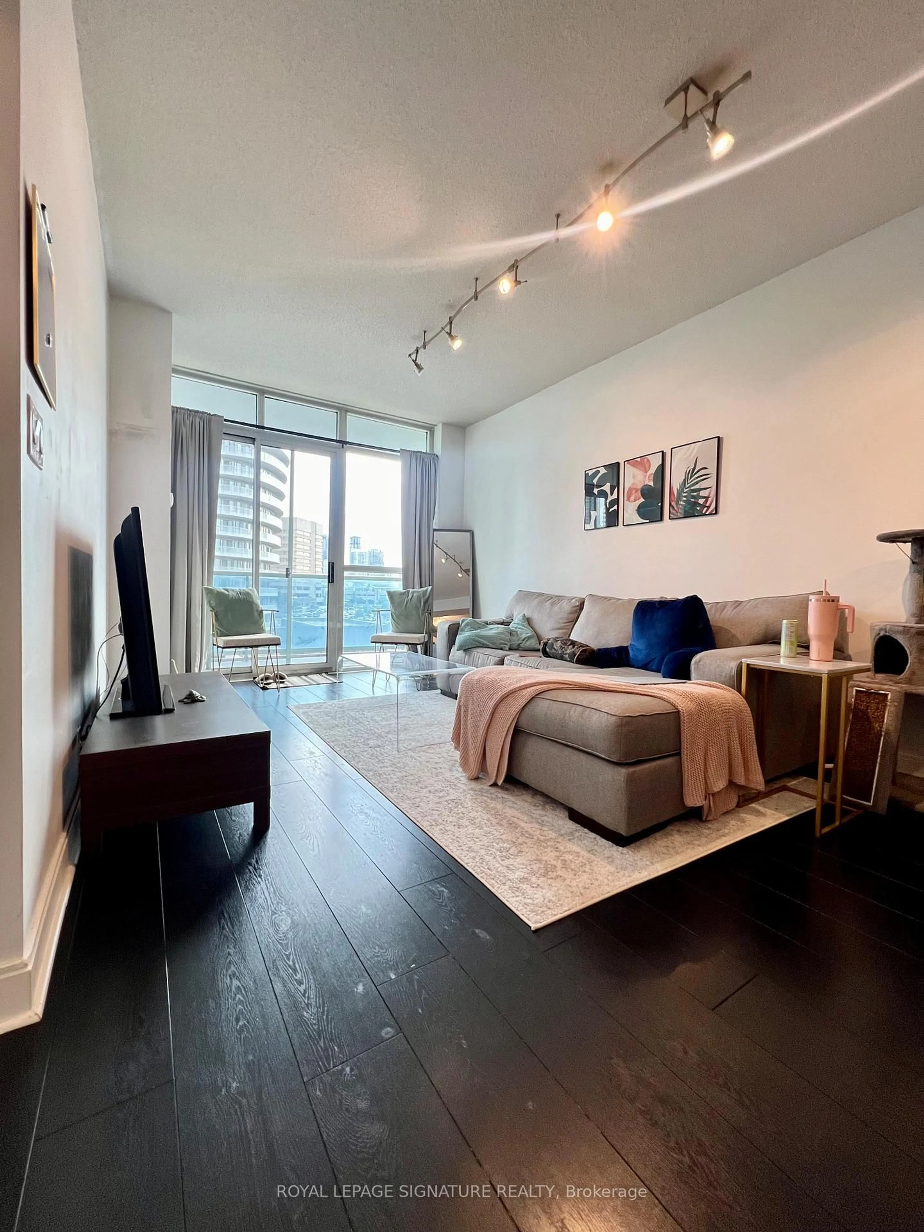 Living room with furniture, unknown for 80 Absolute Ave #607, Mississauga Ontario L4Z 0A5