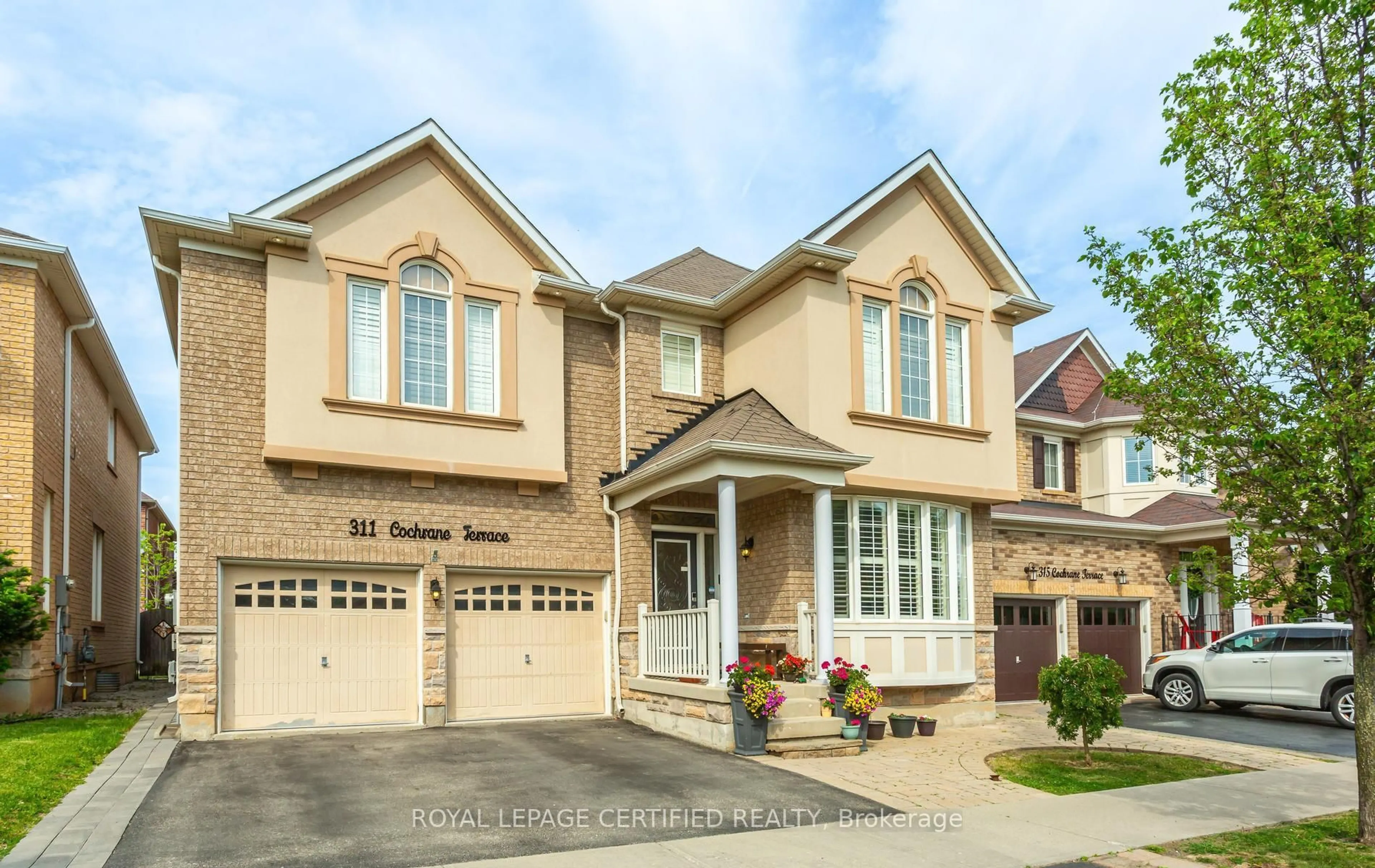 Home with brick exterior material, street for 311 Cochrane Terr, Milton Ontario L9T 8C8