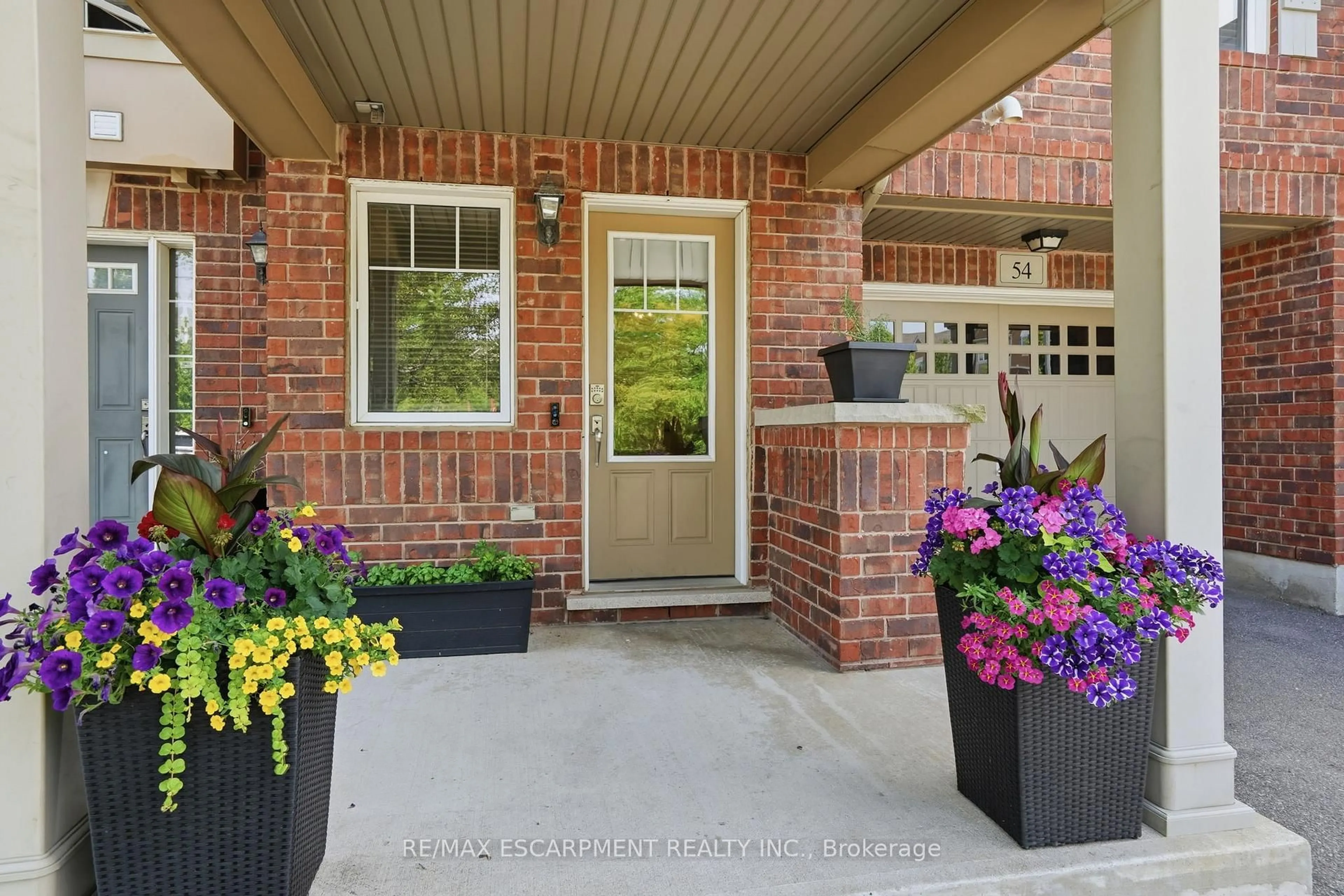 Home with brick exterior material, street for 3050 ROTARY Way #54, Burlington Ontario L7M 0G8