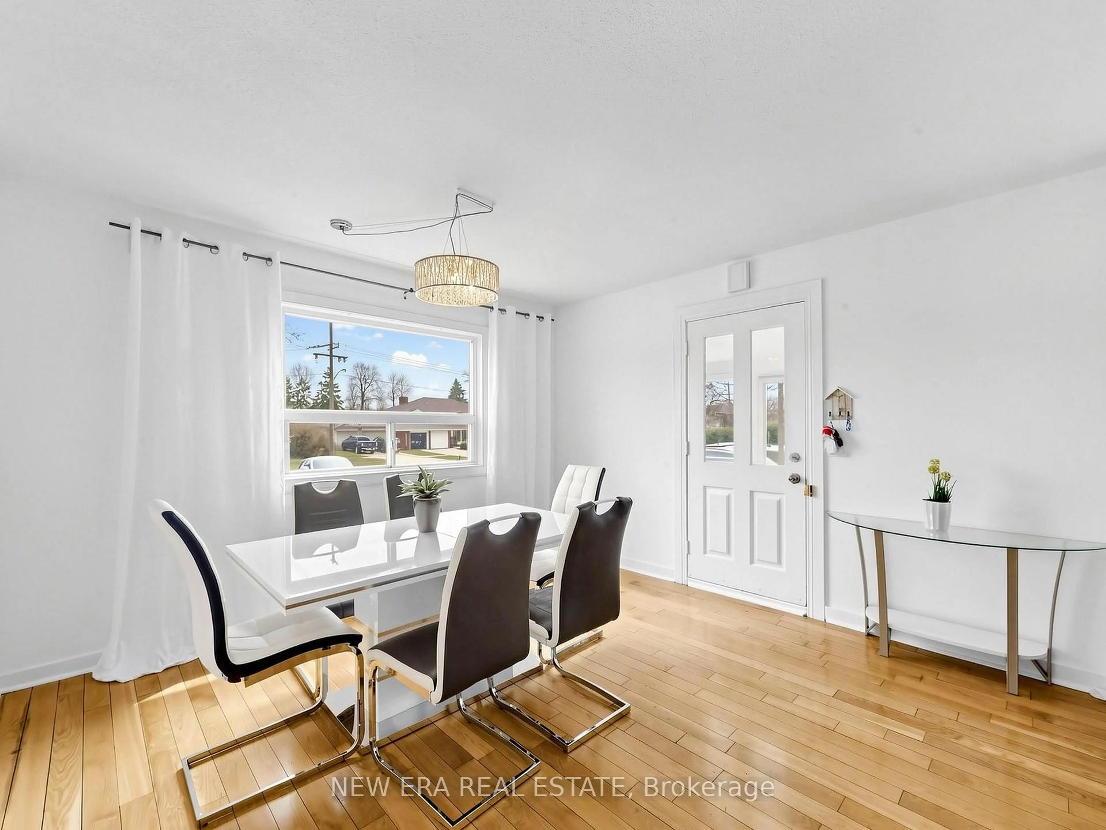 Dining room, wood/laminate floor for 4246 Bloor St, Toronto Ontario M9C 1Z7