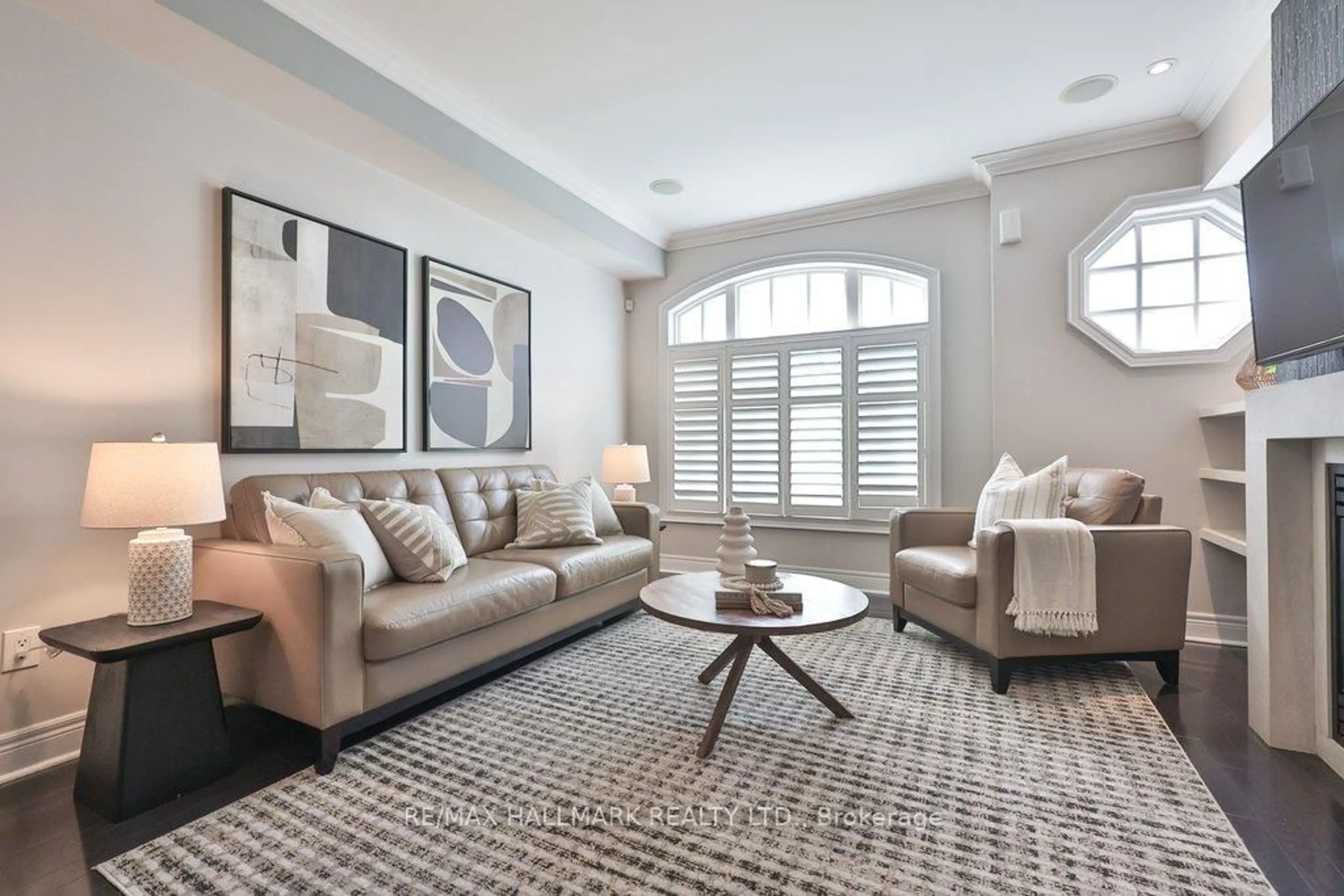 Living room with furniture, carpet floor for 32 Lobo Mews, Toronto Ontario M8Z 0B1