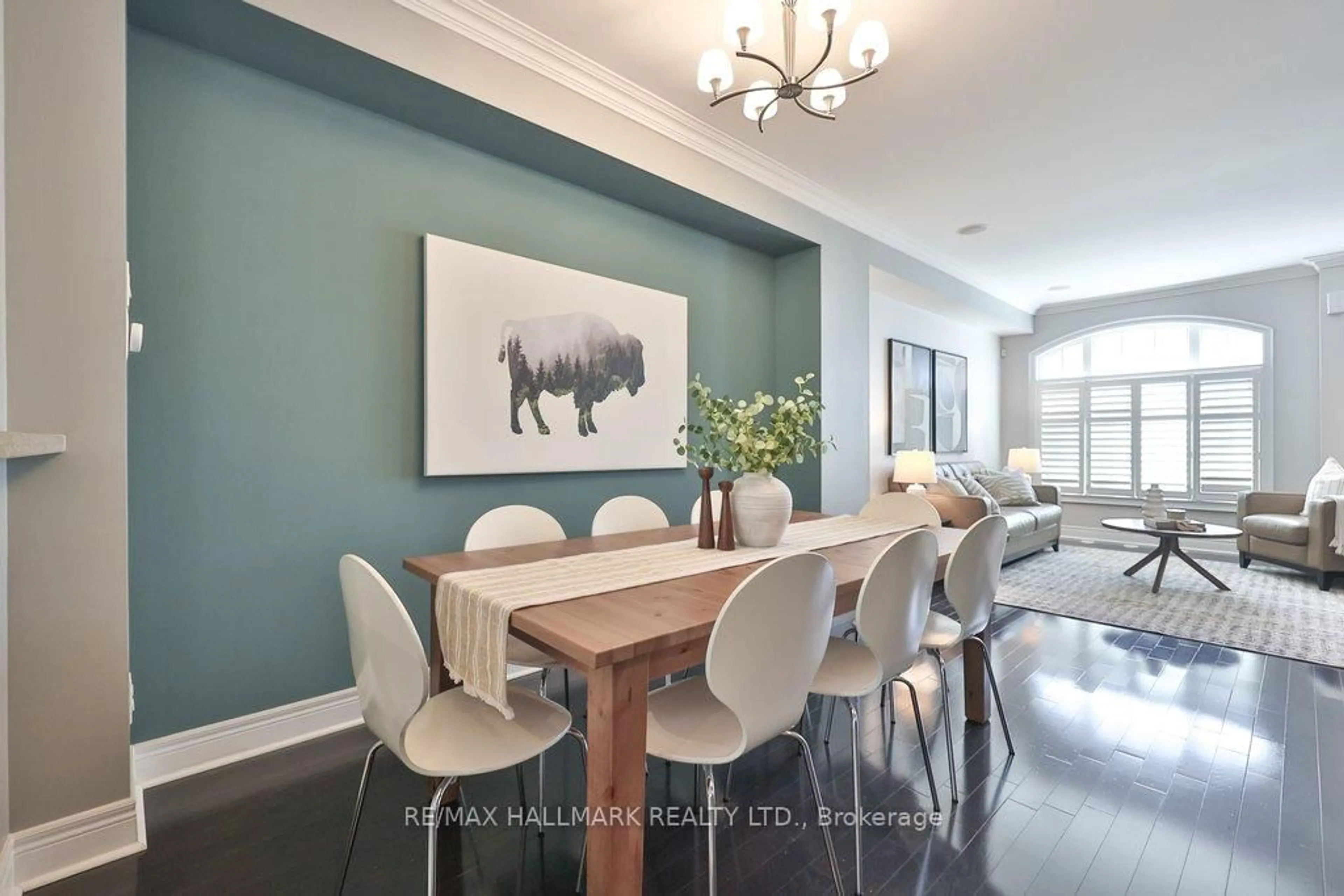 Dining room, wood/laminate floor for 32 Lobo Mews, Toronto Ontario M8Z 0B1