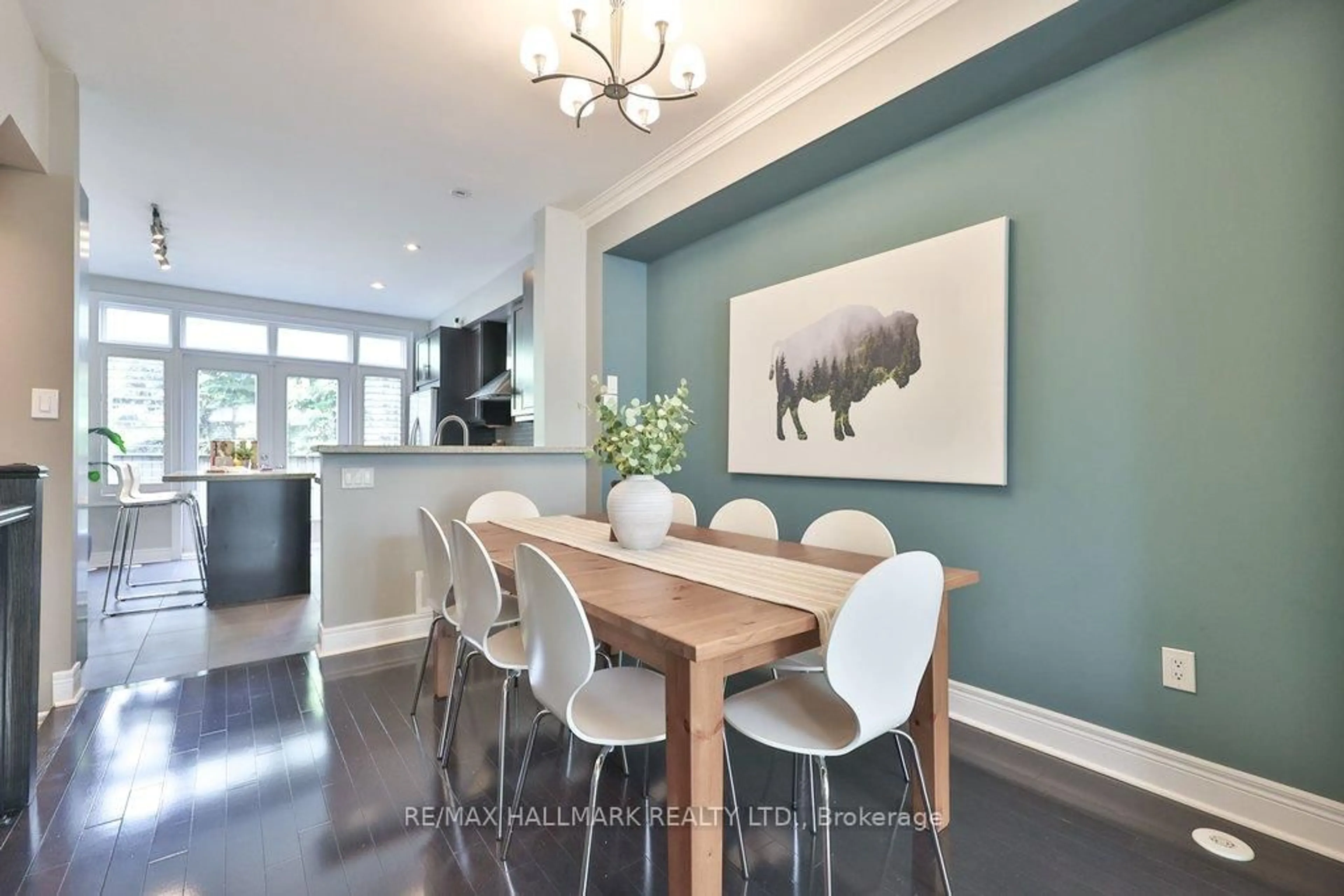 Dining room, wood/laminate floor for 32 Lobo Mews, Toronto Ontario M8Z 0B1
