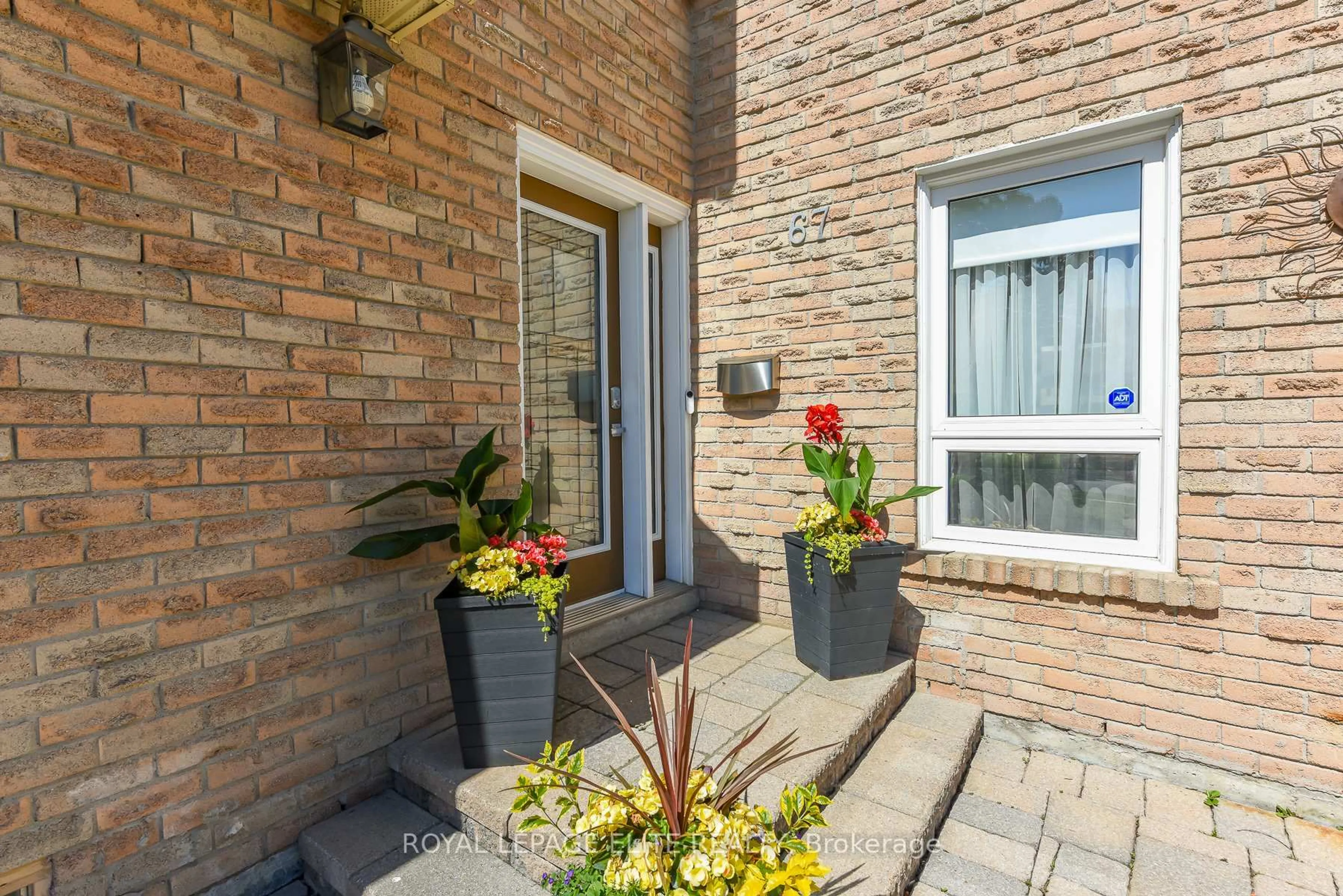 Patio, street for 67 Elmbrook Cres, Toronto Ontario M9C 5C7
