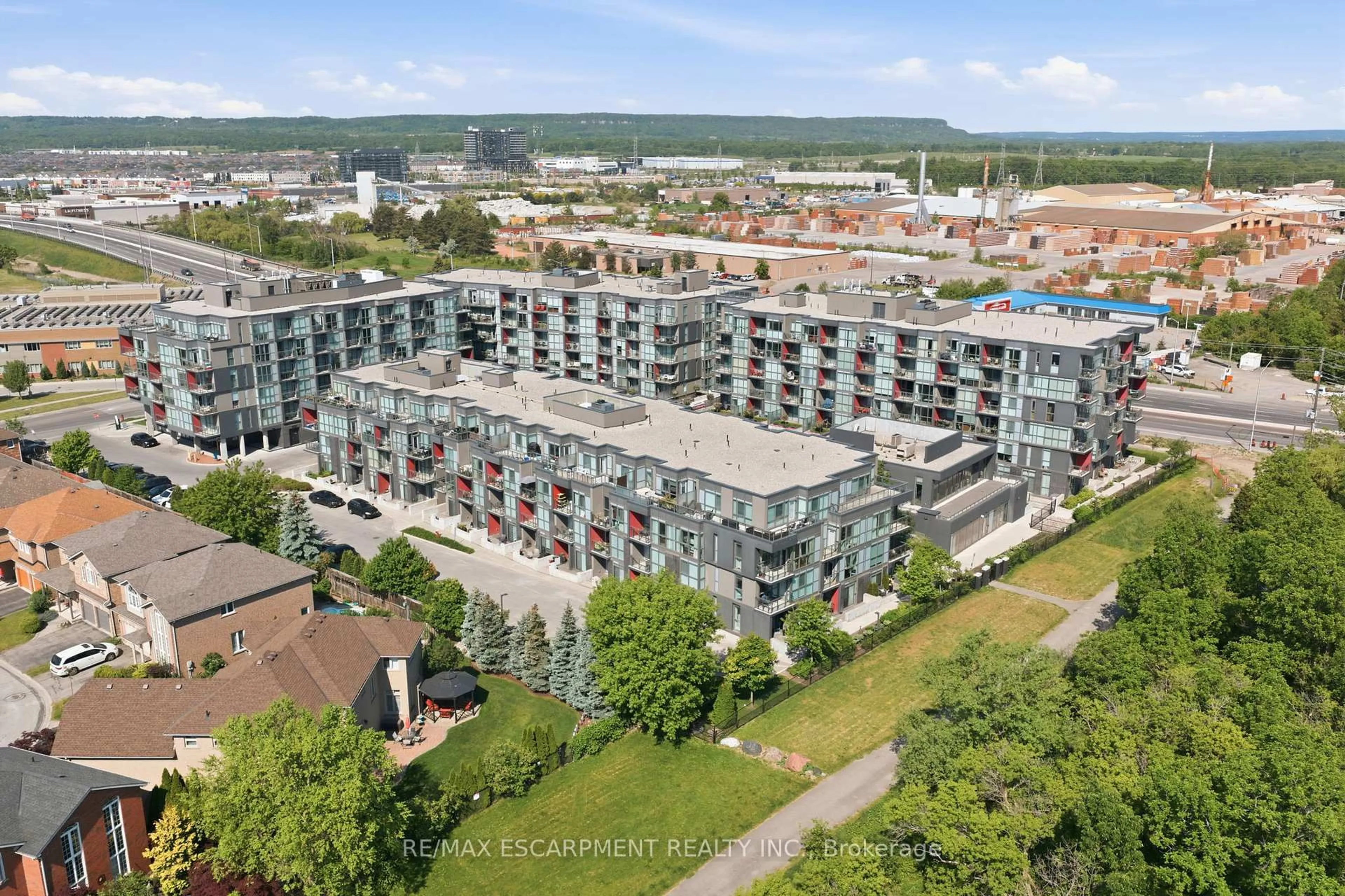 A pic from outside/outdoor area/front of a property/back of a property/a pic from drone, city buildings view from balcony for 5260 Dundas St #C212, Burlington Ontario L7L 0J7