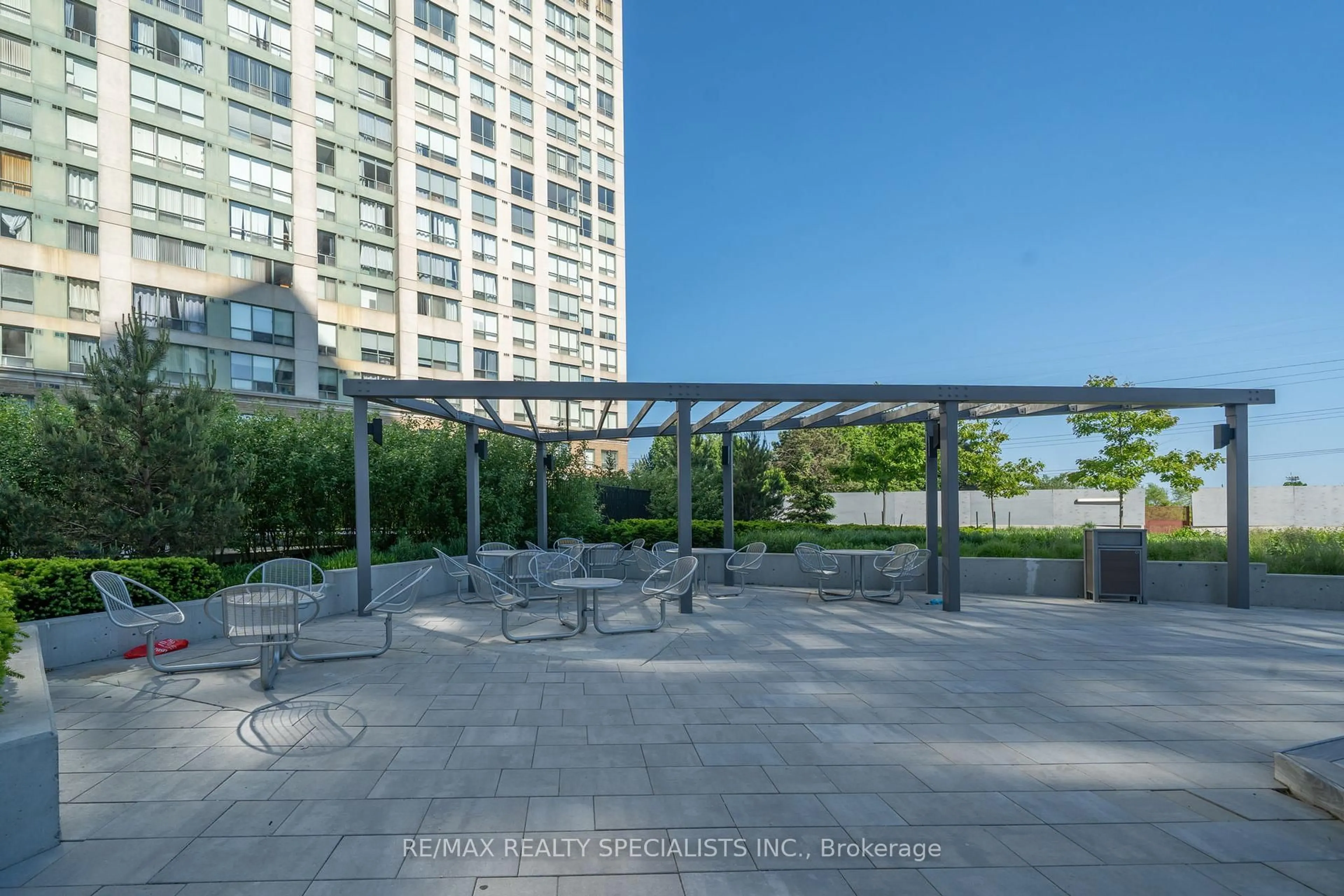 Patio, city buildings view from balcony for 30 Samuel Wood Way #303, Toronto Ontario M9B 0C9