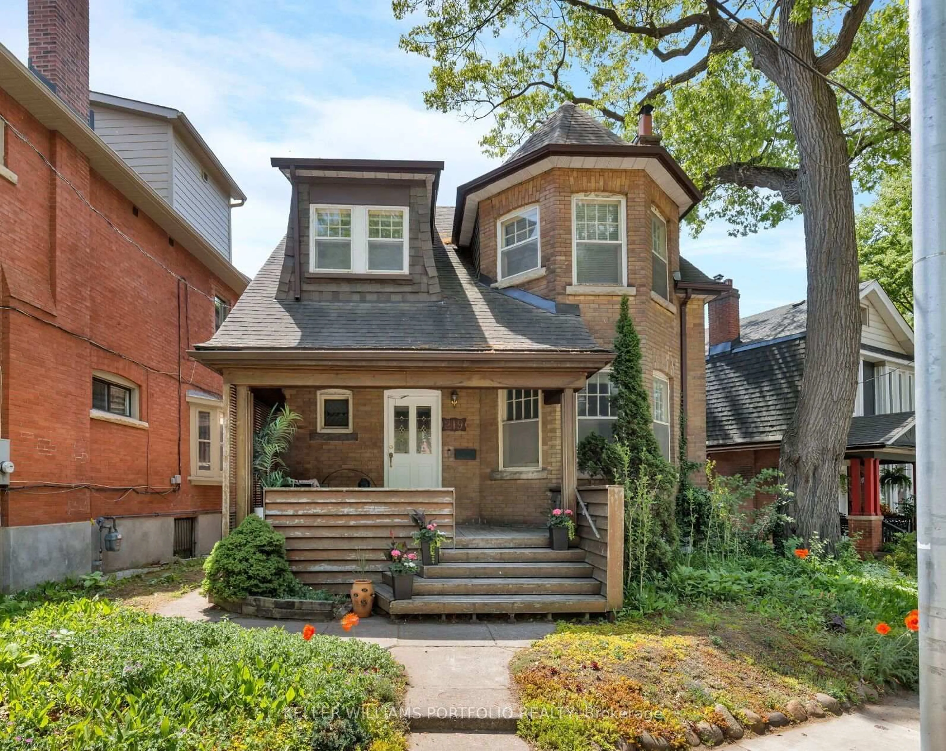 Home with brick exterior material, street for 219 Howard Park Ave, Toronto Ontario M6R 1V9