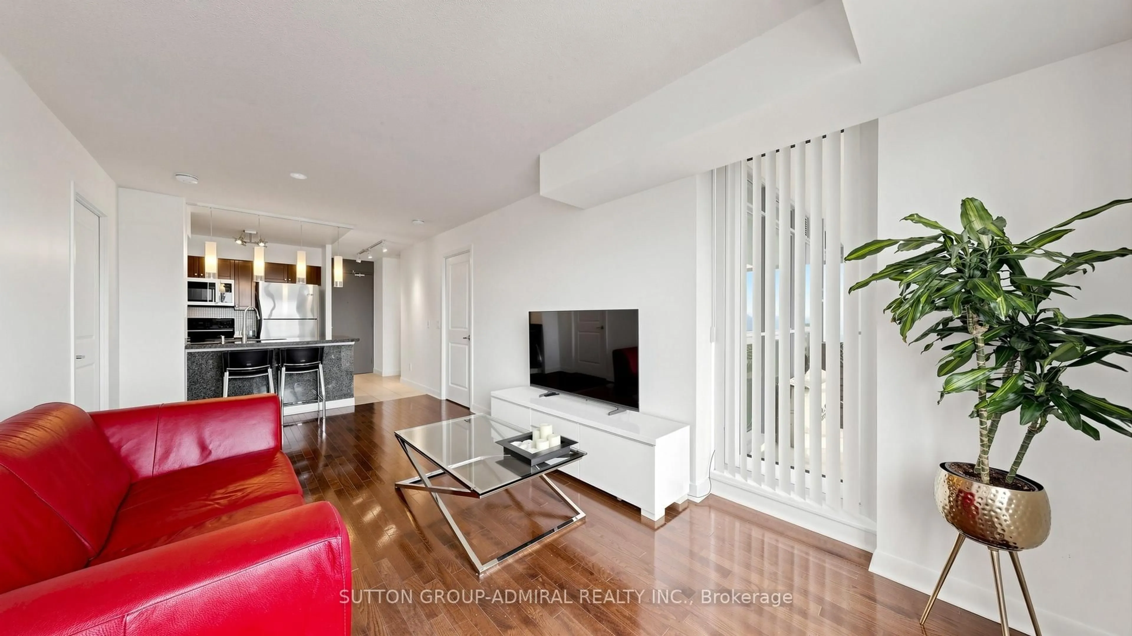Living room with furniture, wood/laminate floor for 225 Sherway Gardens Rd #1408, Toronto Ontario M9C 0A3