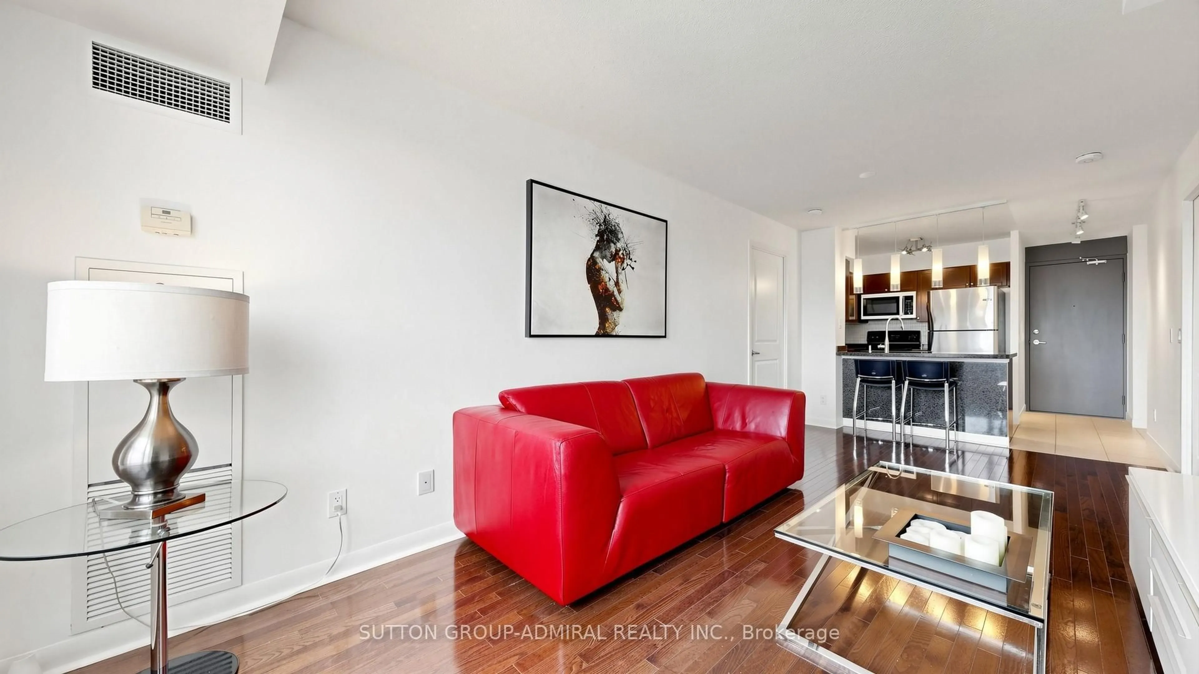 Living room with furniture, wood/laminate floor for 225 Sherway Gardens Rd #1408, Toronto Ontario M9C 0A3