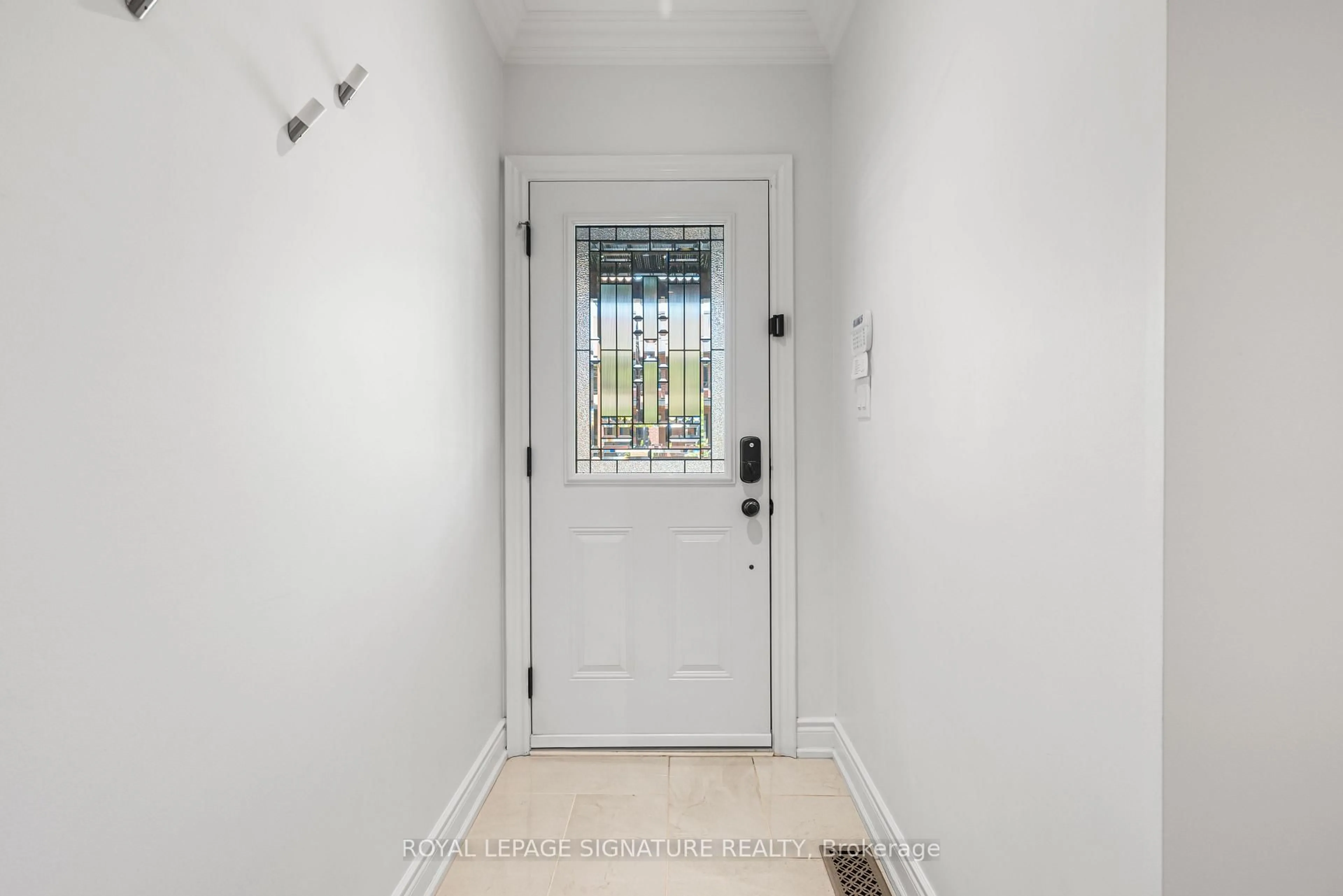 Indoor entryway for 79 Pendrith St, Toronto Ontario M6G 1R8