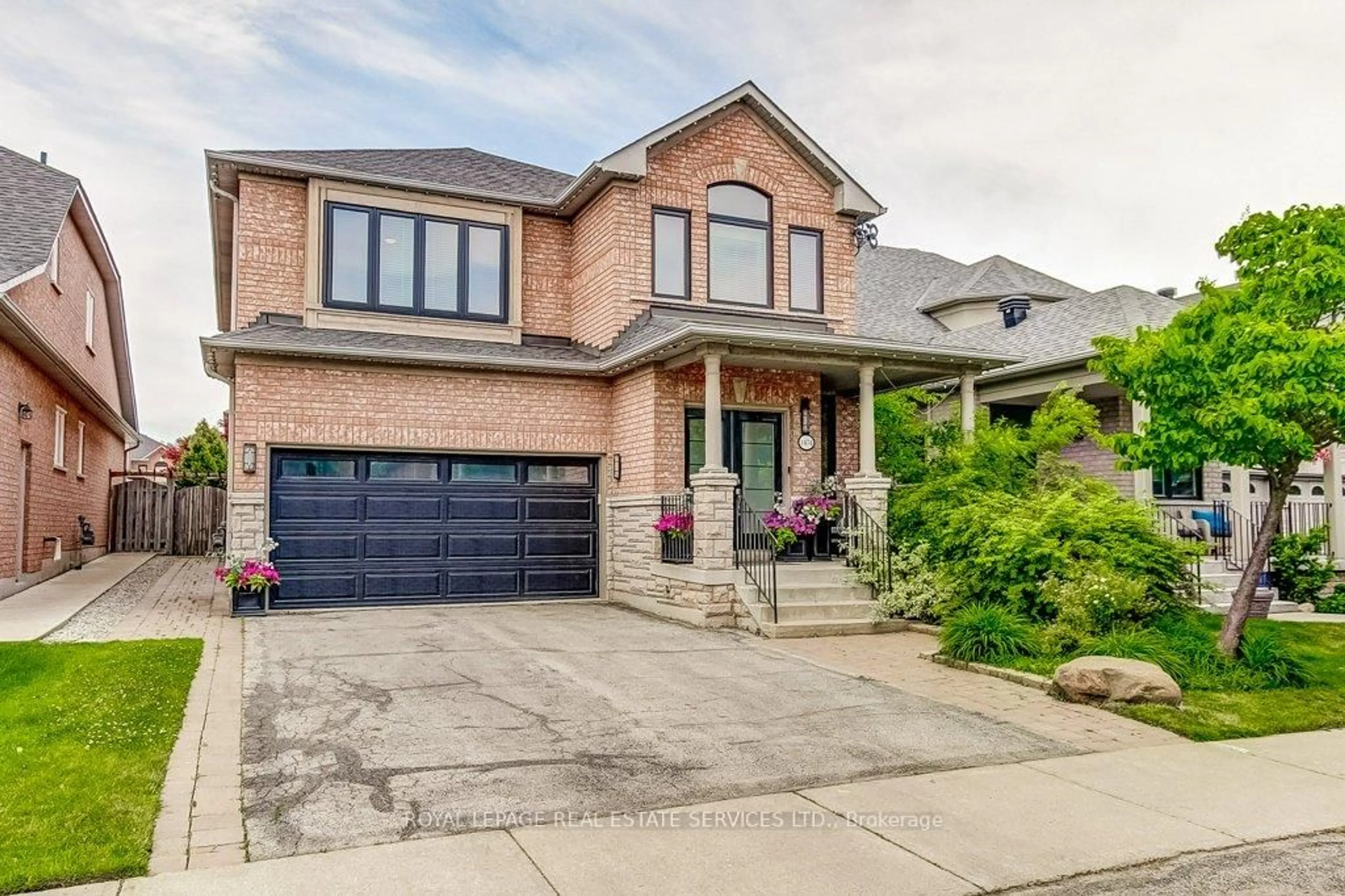 Home with brick exterior material, street for 1474 Derby County Cres, Oakville Ontario L6M 4N9