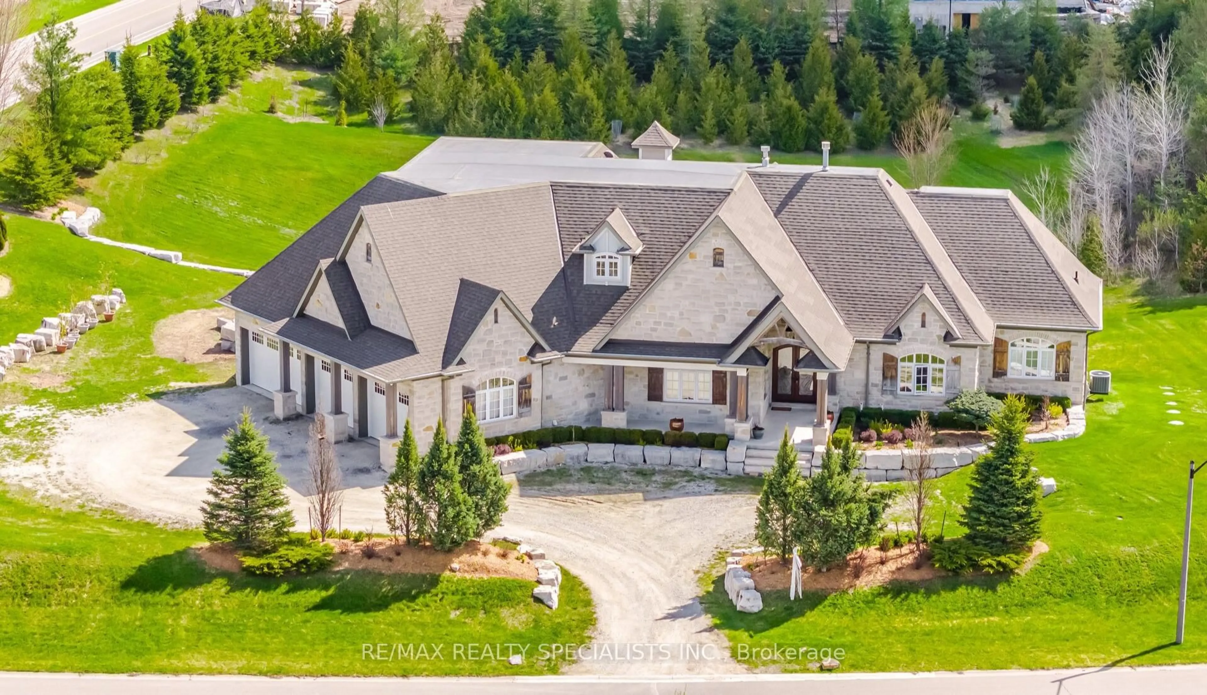 A pic from outside/outdoor area/front of a property/back of a property/a pic from drone, mountain view for 1 Edgewild Dr, Caledon Ontario L7E 4H7