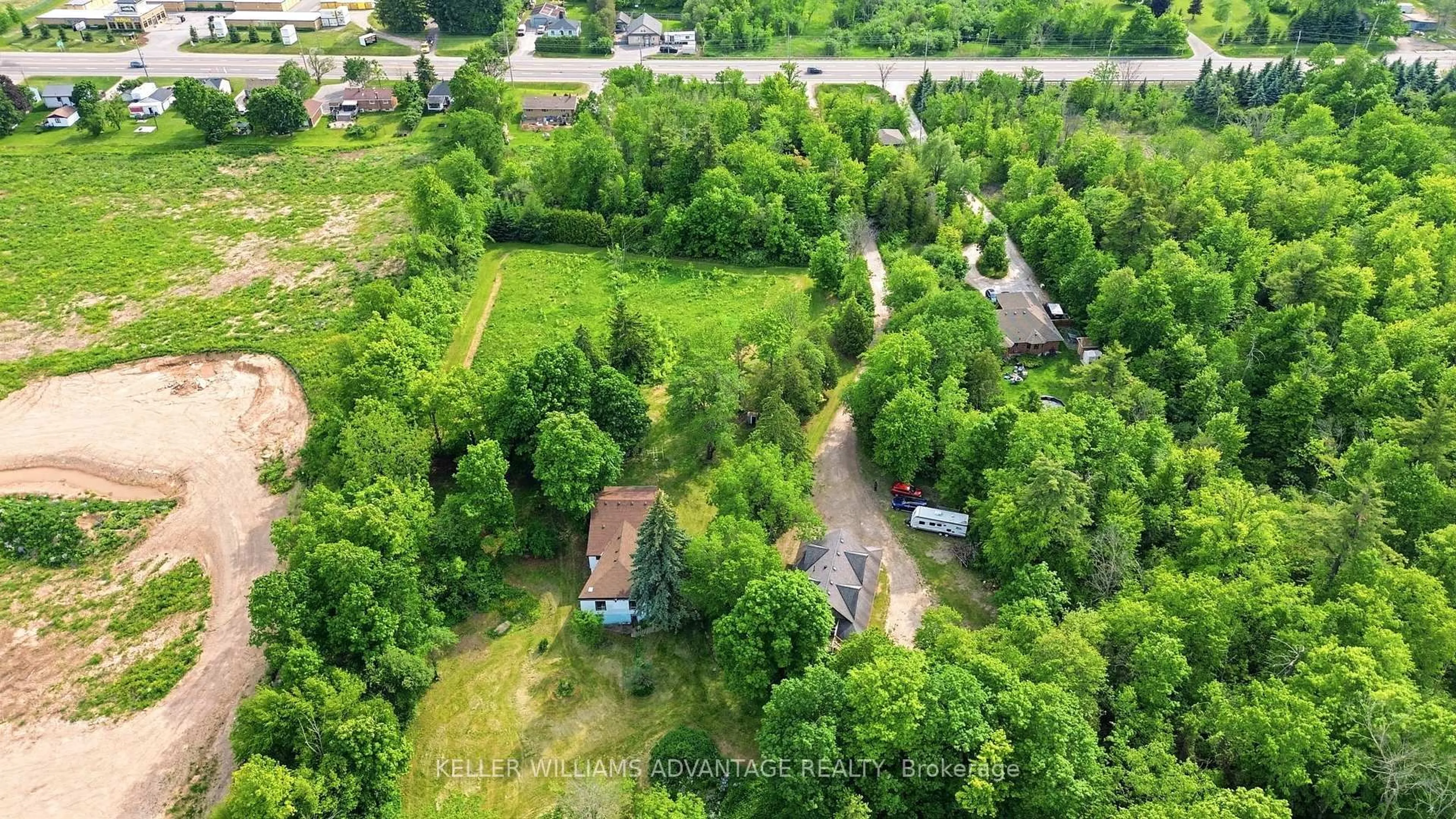 A pic from outside/outdoor area/front of a property/back of a property/a pic from drone, forest/trees view for 13353 Highway 7 W Highway, Halton Hills Ontario L7G 4S4