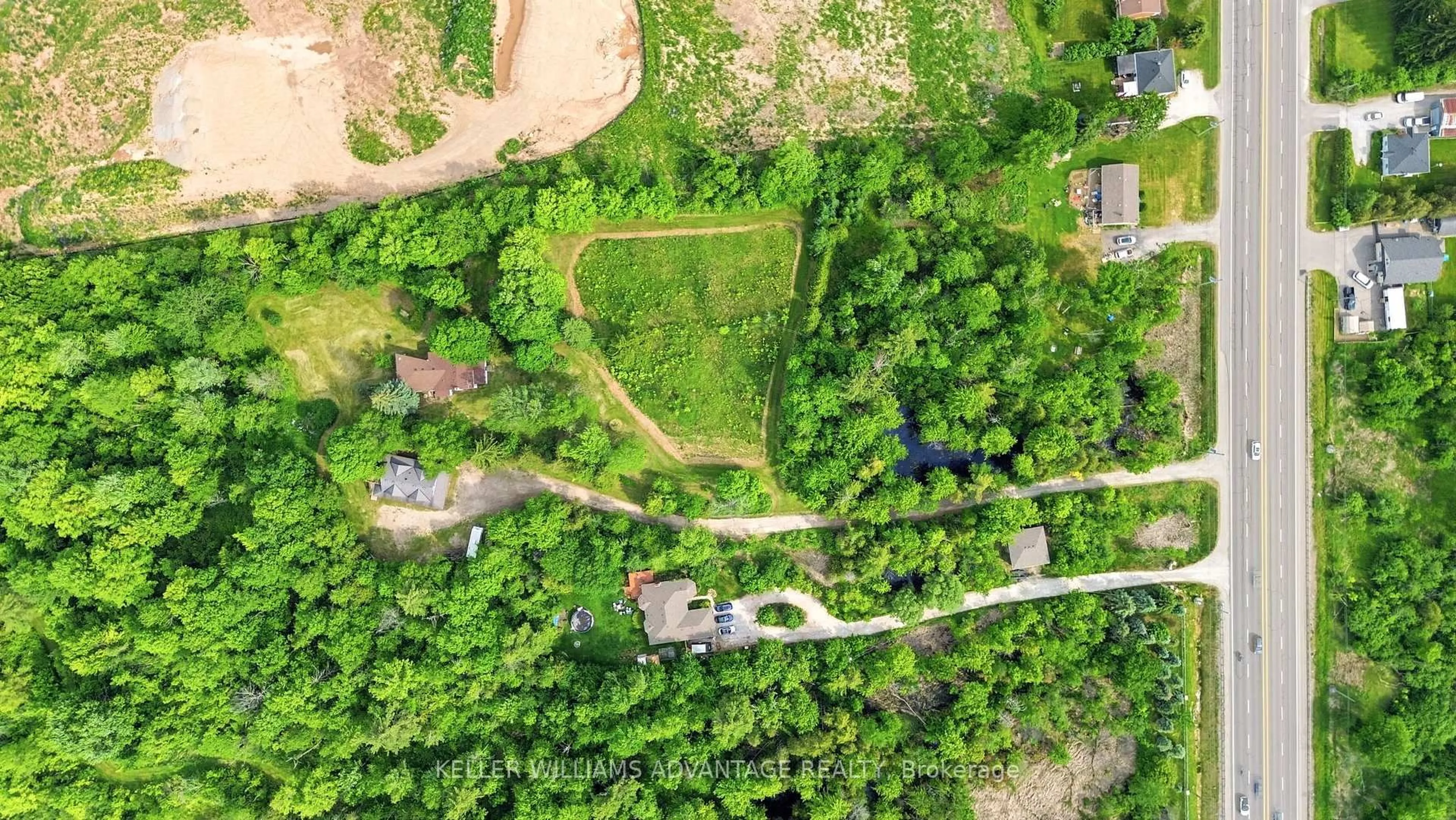 A pic from outside/outdoor area/front of a property/back of a property/a pic from drone, forest/trees view for 13353 Highway 7 W Highway, Halton Hills Ontario L7G 4S4