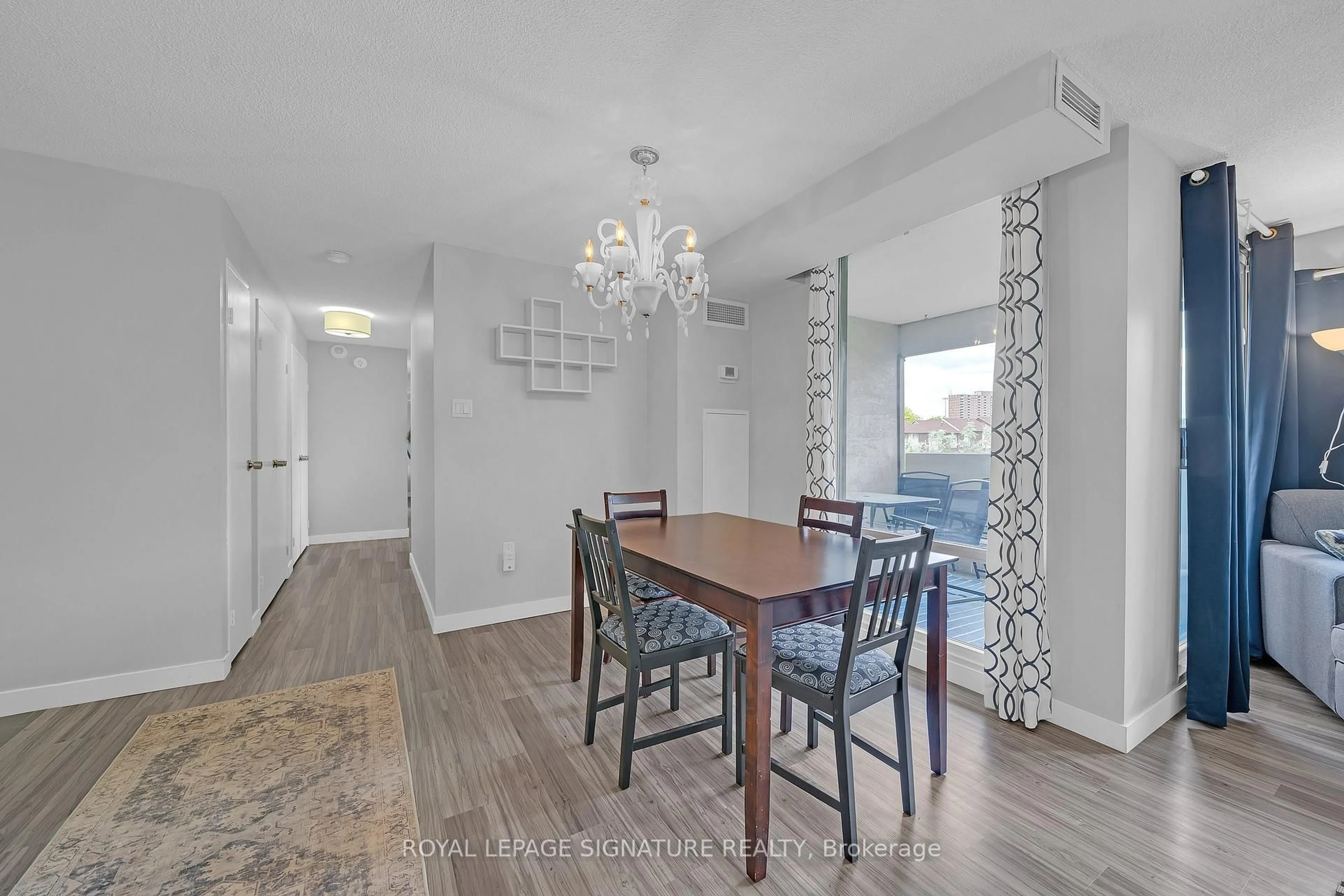 Dining room, wood/laminate floor for 475 The West Mall #212, Toronto Ontario M9C 4Z3